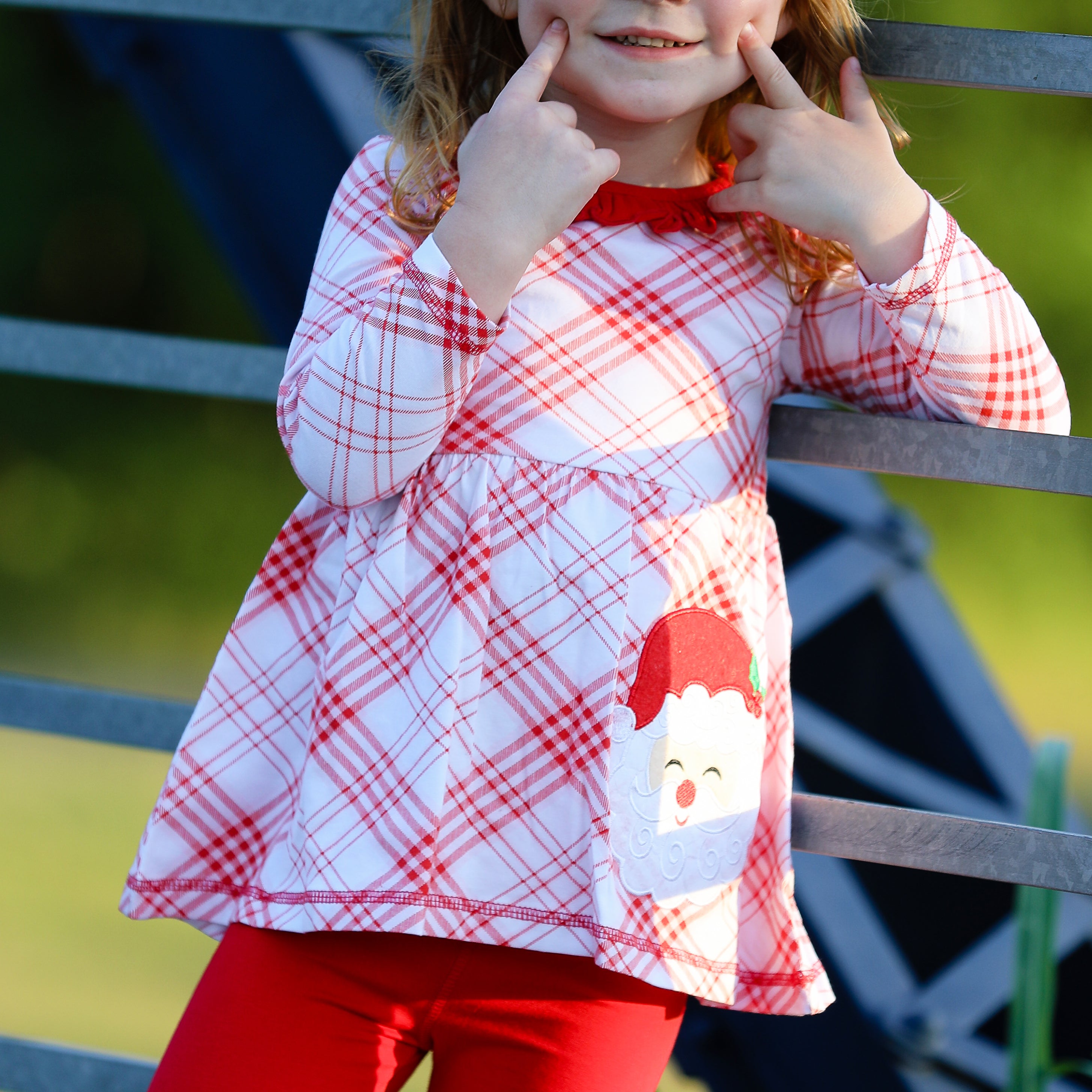 AnnLoren Girls Boutique Santa Holiday Clothing Set featuring a long sleeve dress with Santa applique and red knit leggings.