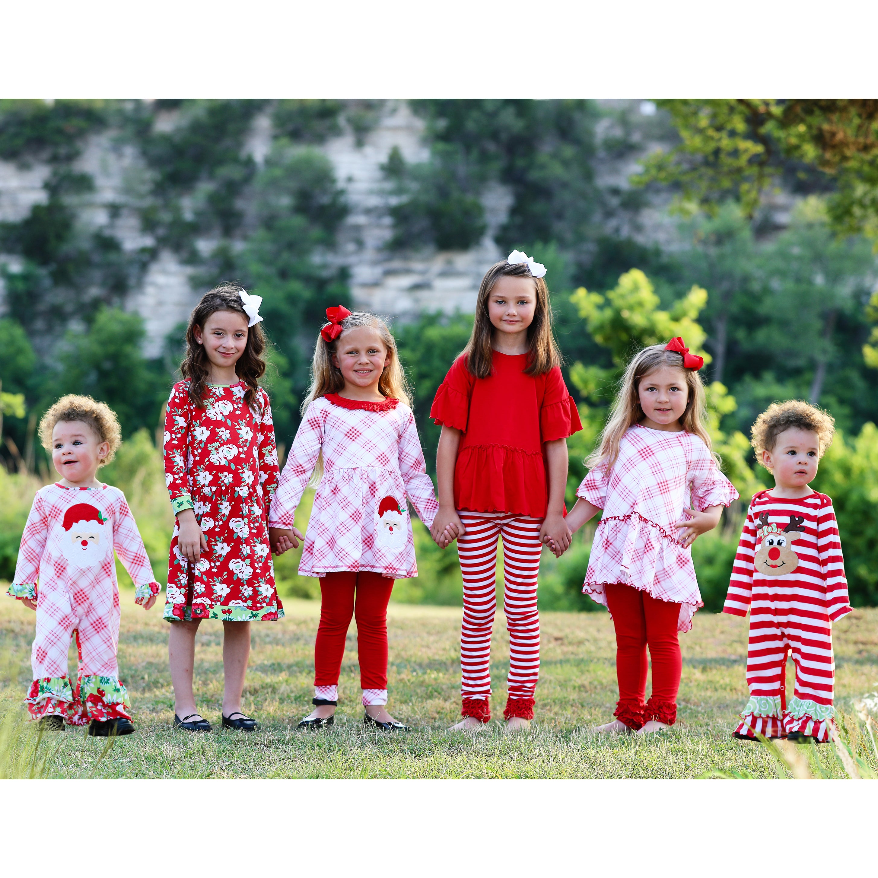 AnnLoren Girls Boutique Santa Holiday Clothing Set featuring a long sleeve dress with Santa applique and red knit leggings.