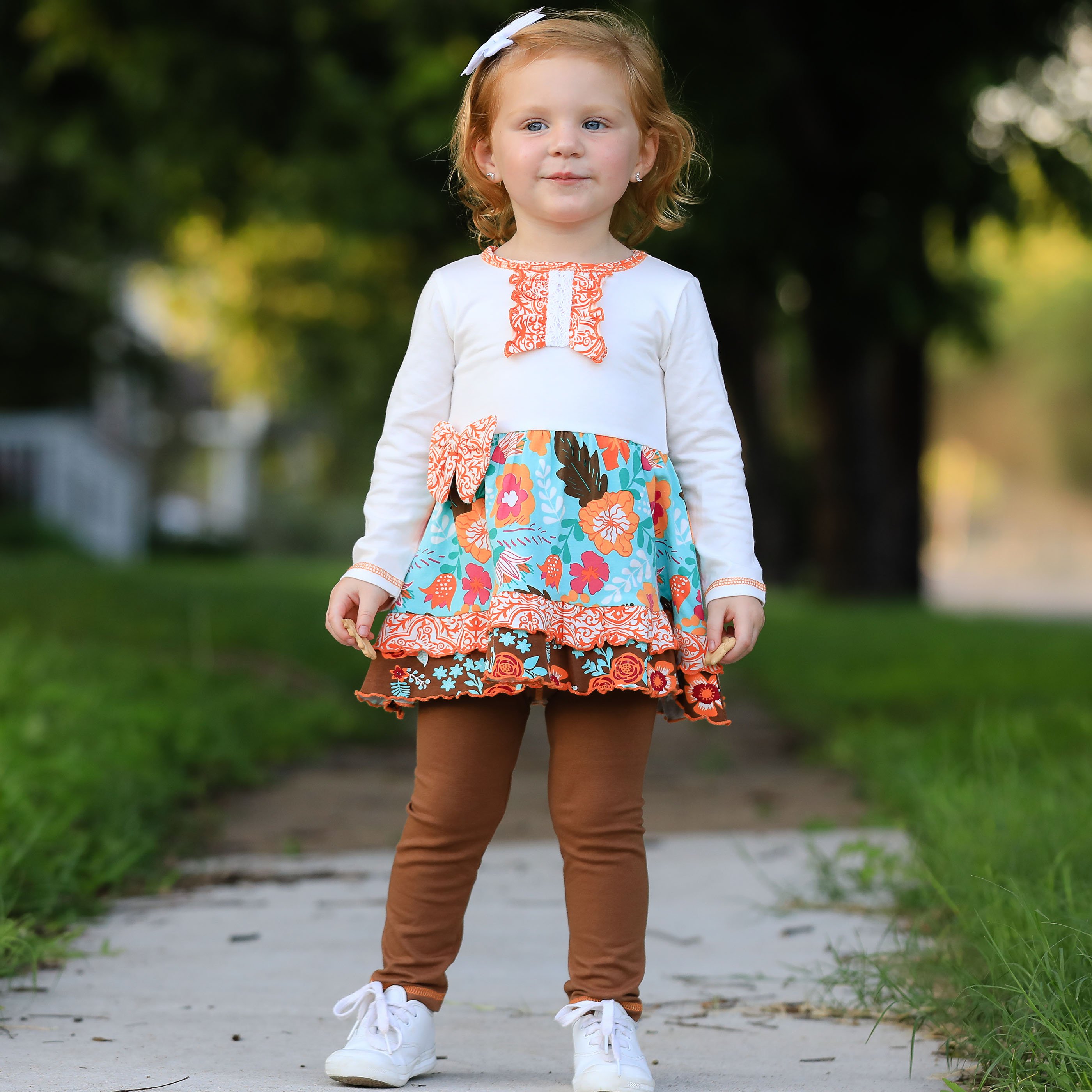 AnnLoren Girls Holiday Autumn Floral Ruffle Dress featuring cream long sleeves, orange damask ruffle, and brown leggings.