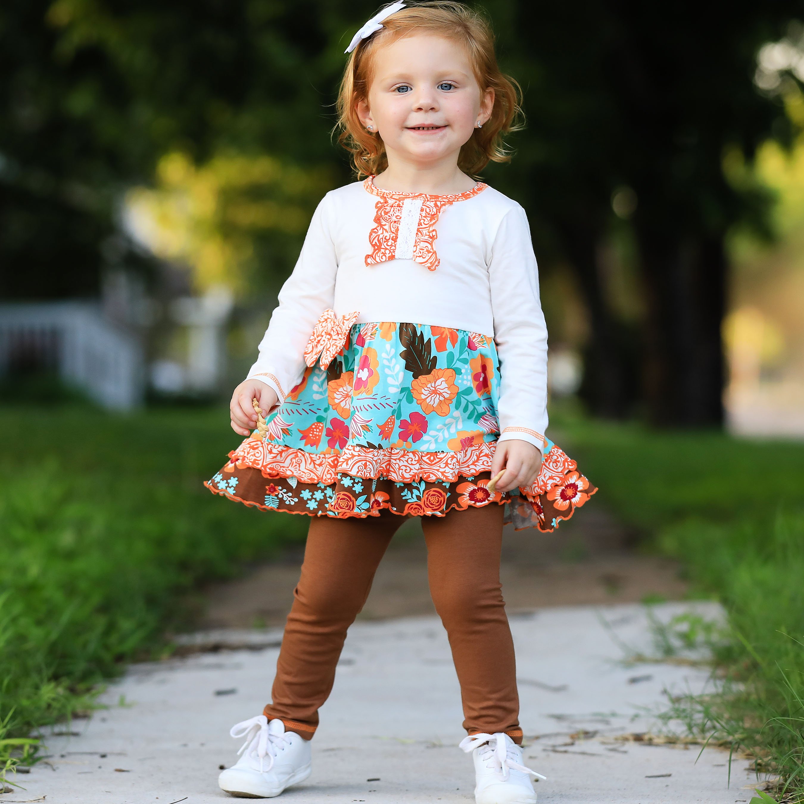 AnnLoren Girls Holiday Autumn Floral Ruffle Dress featuring cream long sleeves, orange damask ruffle, and brown leggings.