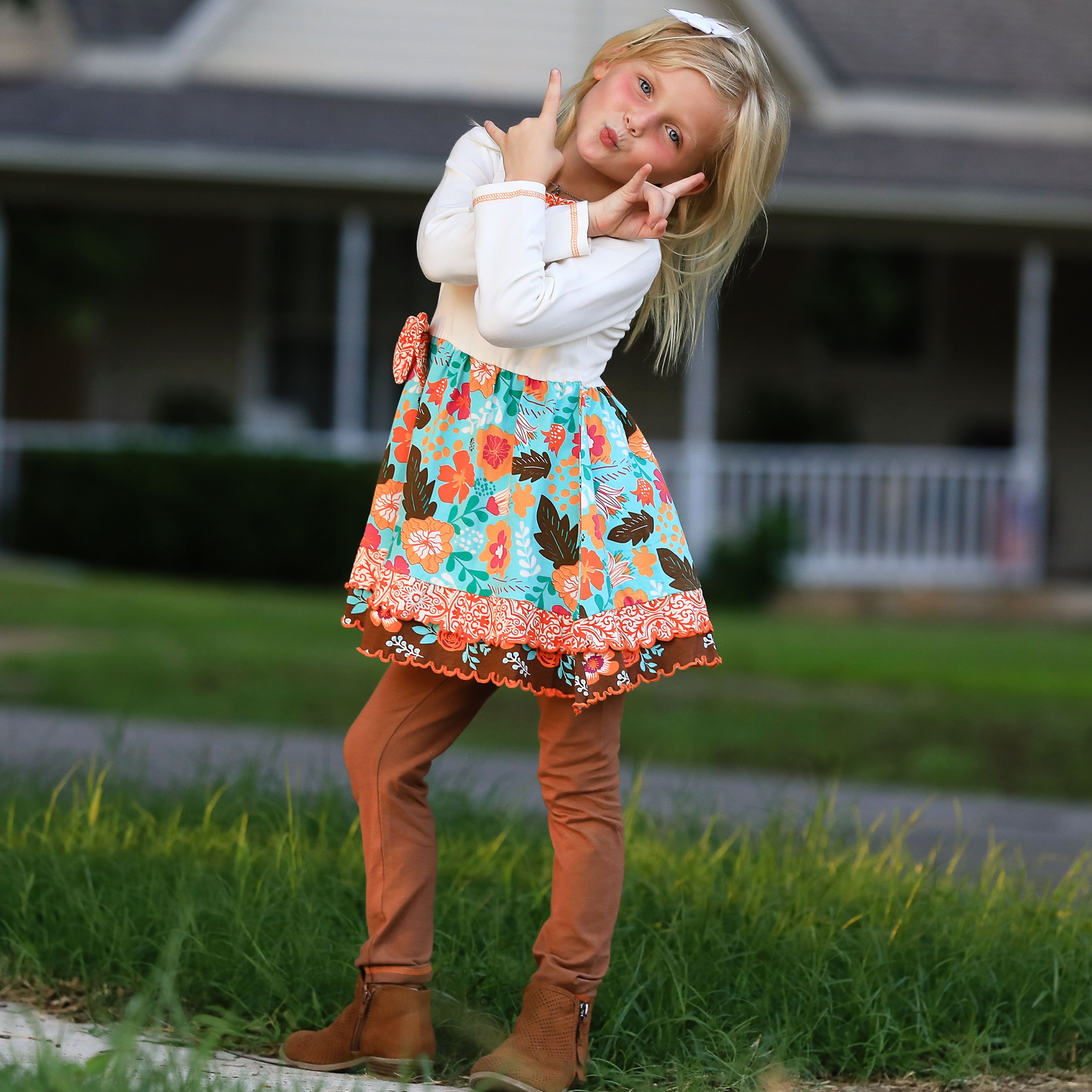 AnnLoren Girls Holiday Autumn Floral Ruffle Dress featuring cream long sleeves, orange damask ruffle, and brown leggings.