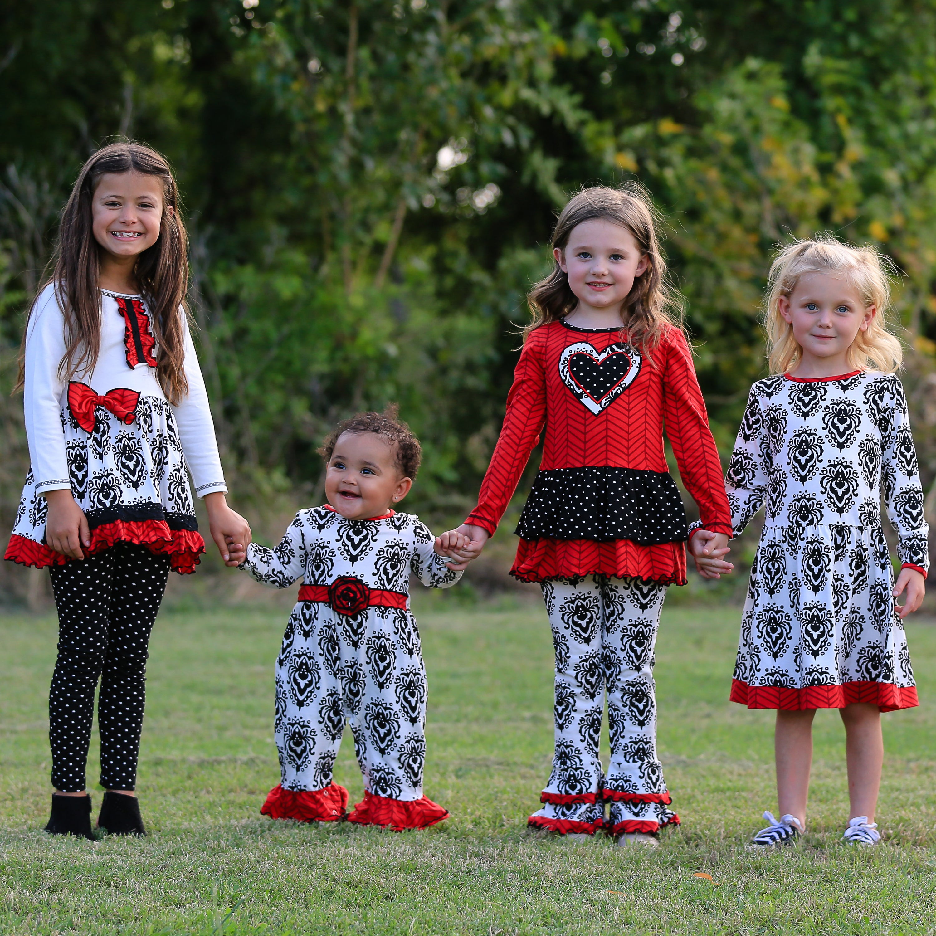 AnnLoren Girls Winter Damask Heart Herringbone Tunic and Legging Set featuring a red tunic with heart appliques and black damask leggings.