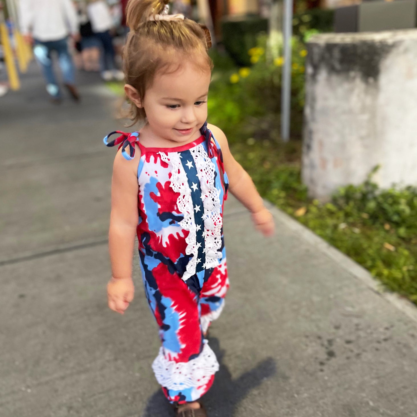 AnnLoren Red, White & Blue Tie Dye Baby Girls Romper featuring spaghetti straps, eyelet trim, and snap closures, perfect for summer celebrations.