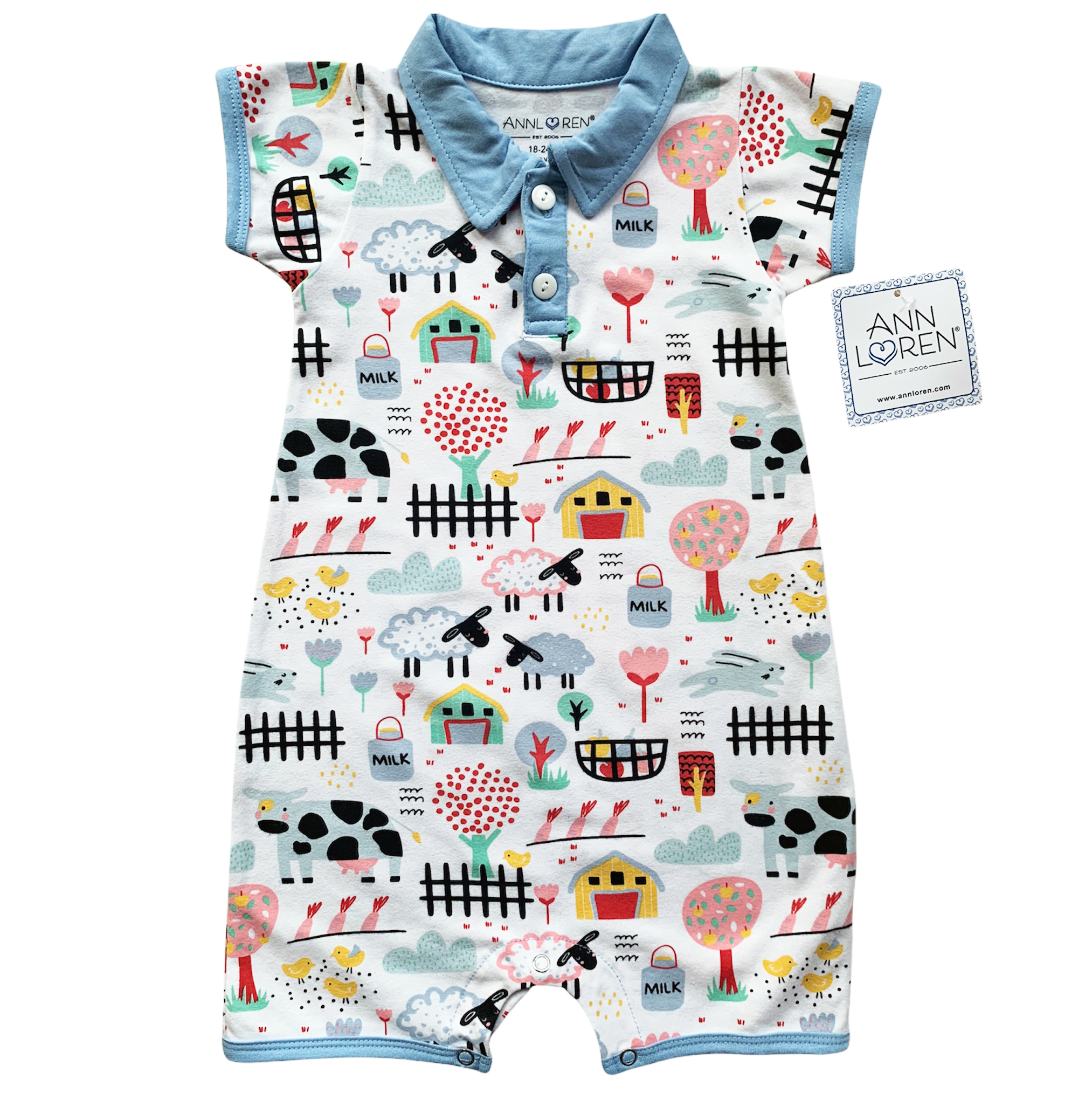 Baby boy wearing a Fun Farm Animal Romper with blue collar and buttons, featuring playful farm animal prints.