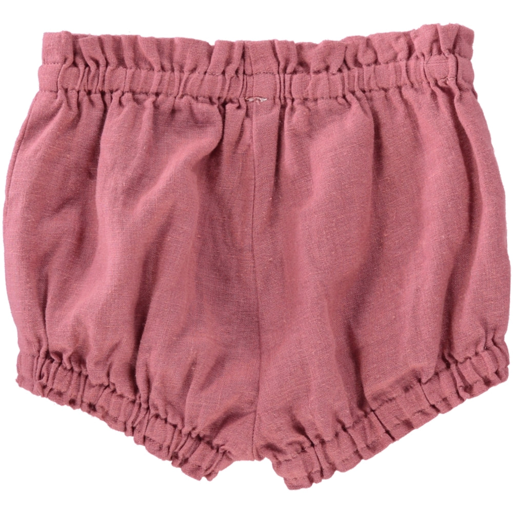 Adorable Bloomers Torre Rose made from 100% linen, featuring an elasticised waistband and legs in charming colors.