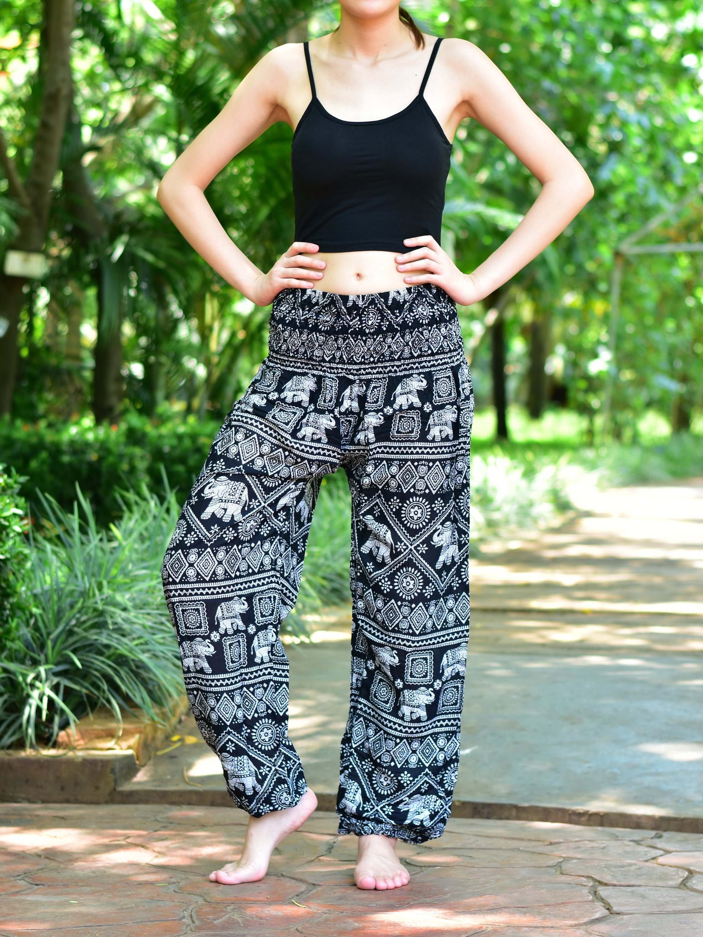 Bohotusk Kids Black Elephant Print Harem Pants featuring elasticated waist and ankles, made from soft rayon fabric.