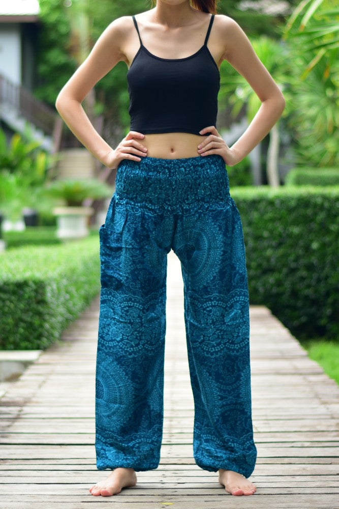 Bohotusk Kids Blue Night Glow Harem Pants featuring elasticated waist and ankles, made from soft rayon, perfect for kids' comfort.