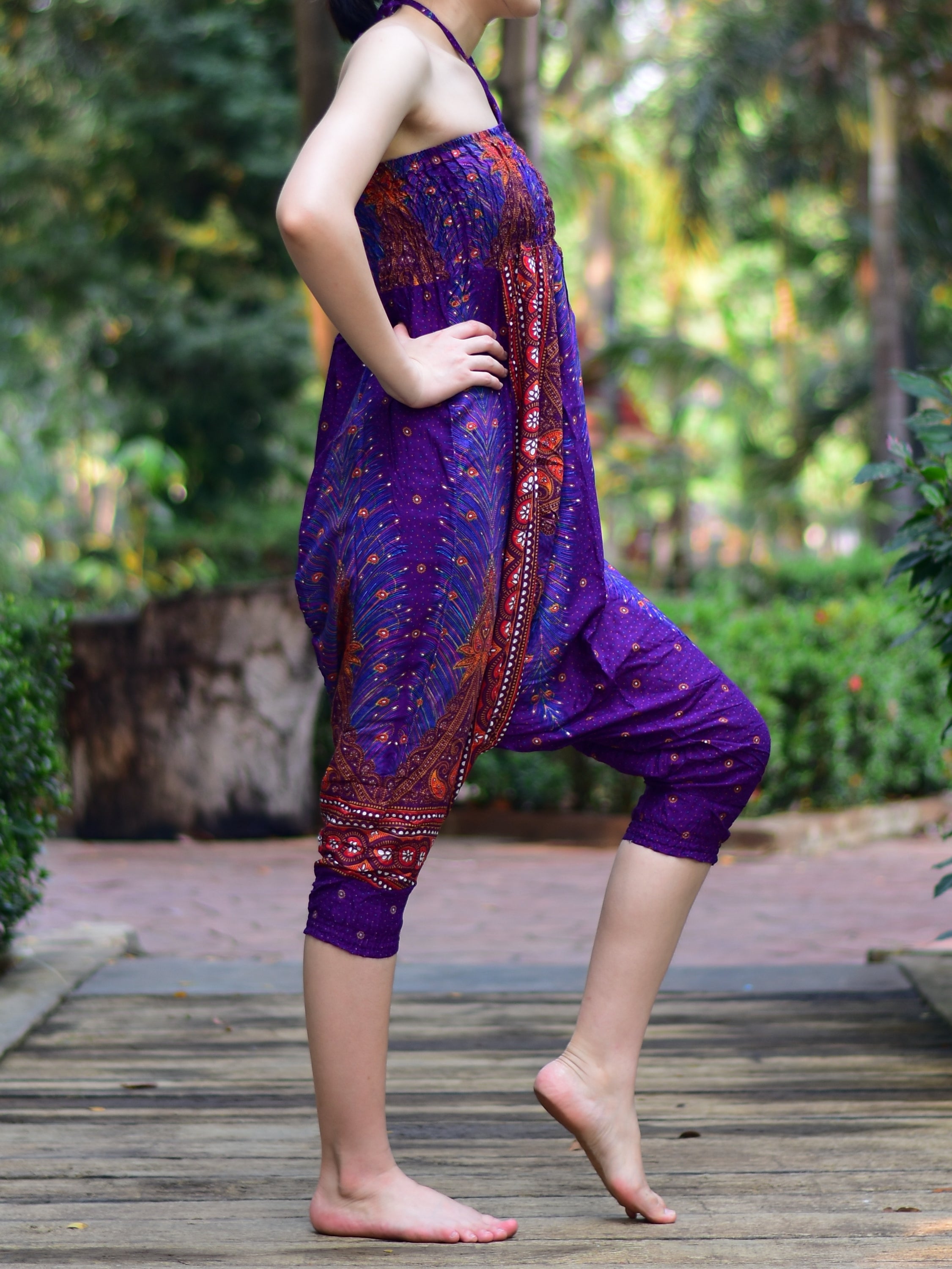 Bohotusk Kids Purple Peacock Jumpsuit showcasing vibrant colors and unique design, perfect for ages 6-8.