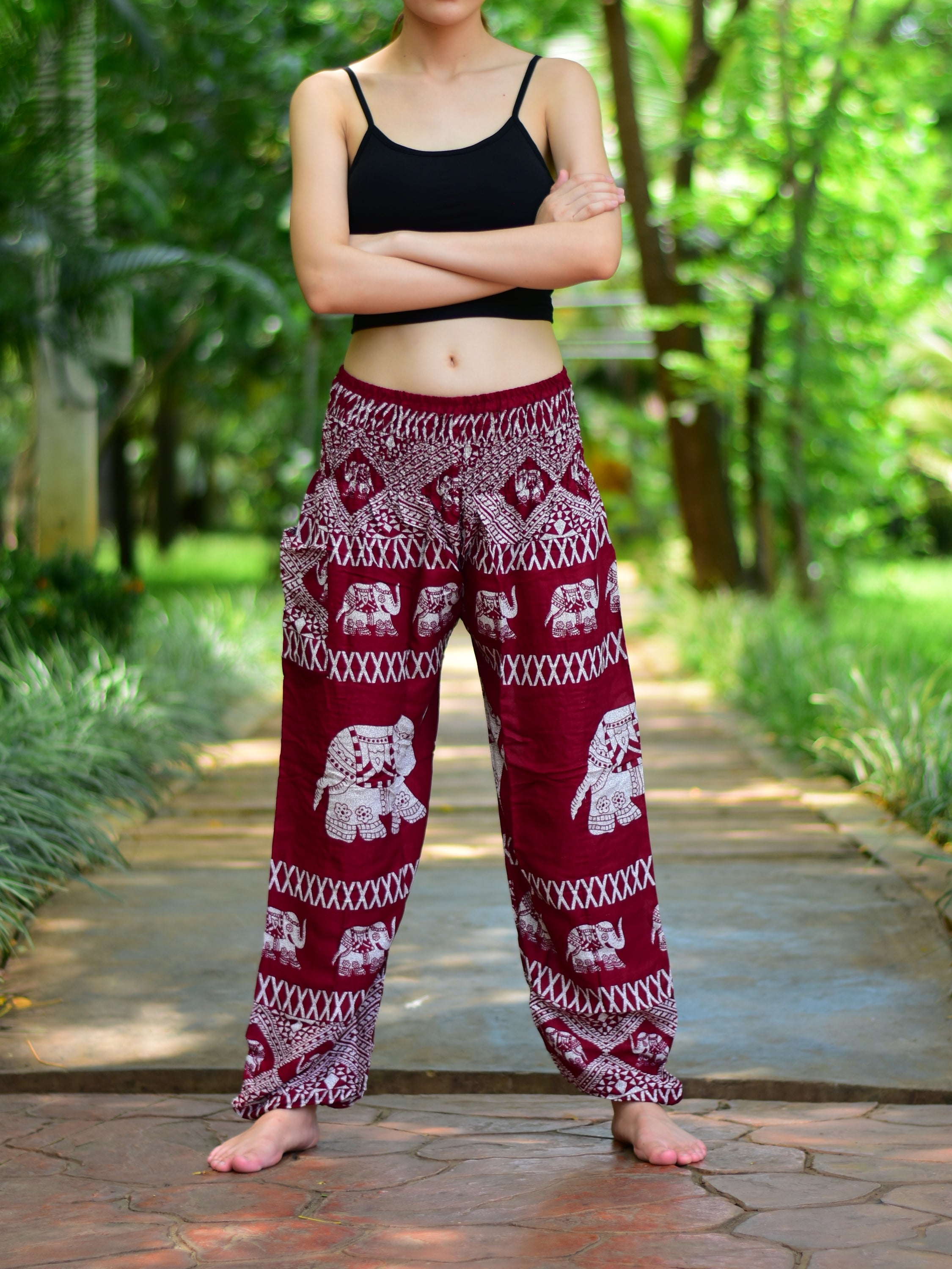 Bohotusk Kids Red Elephant Harem Pants featuring a vibrant elephant print, elasticated waist, and ankles, made from soft rayon fabric.