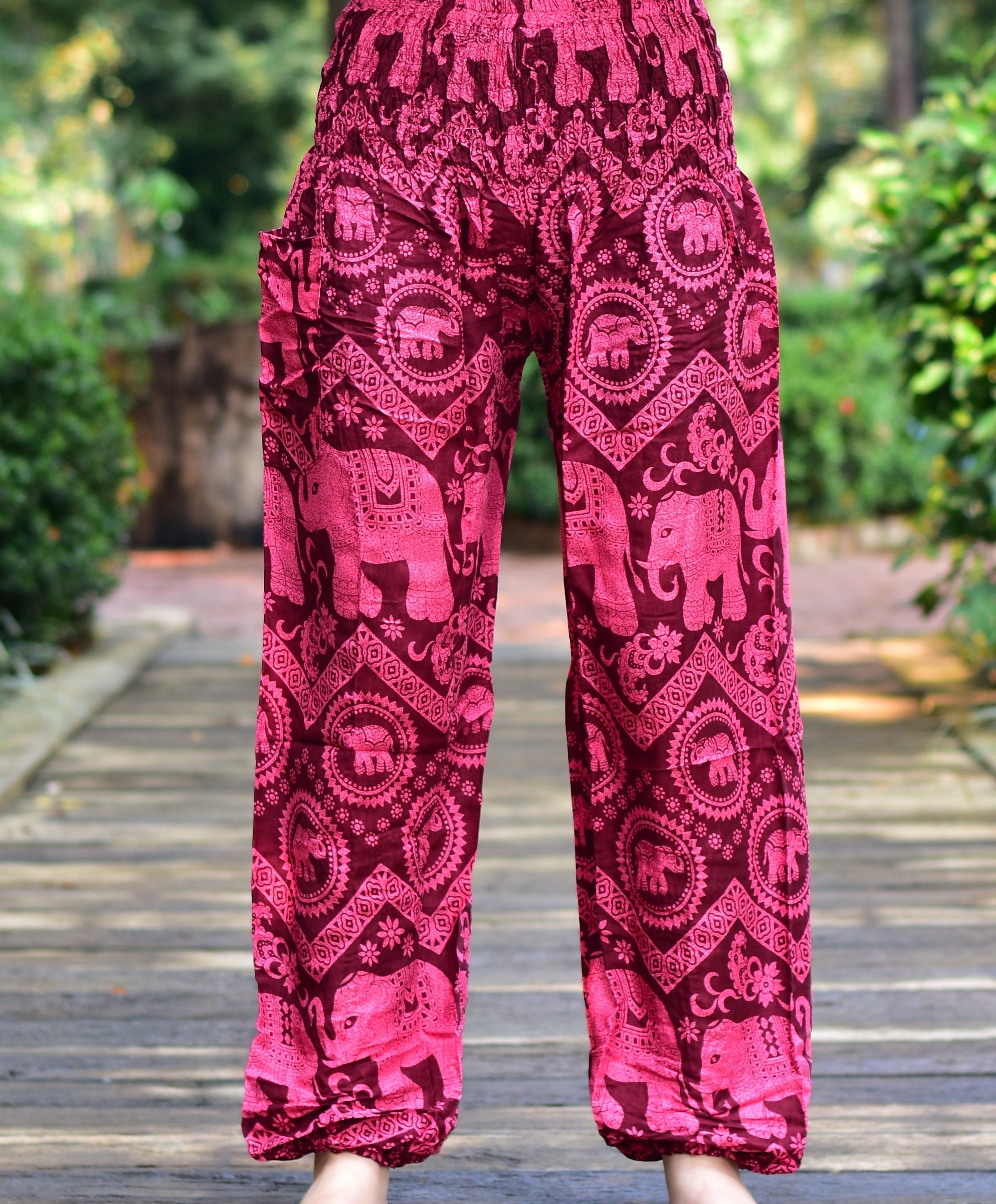 Bohotusk Kids Red Pink Elephant Harem Pants featuring elasticated waist and ankles, made from soft rayon fabric.