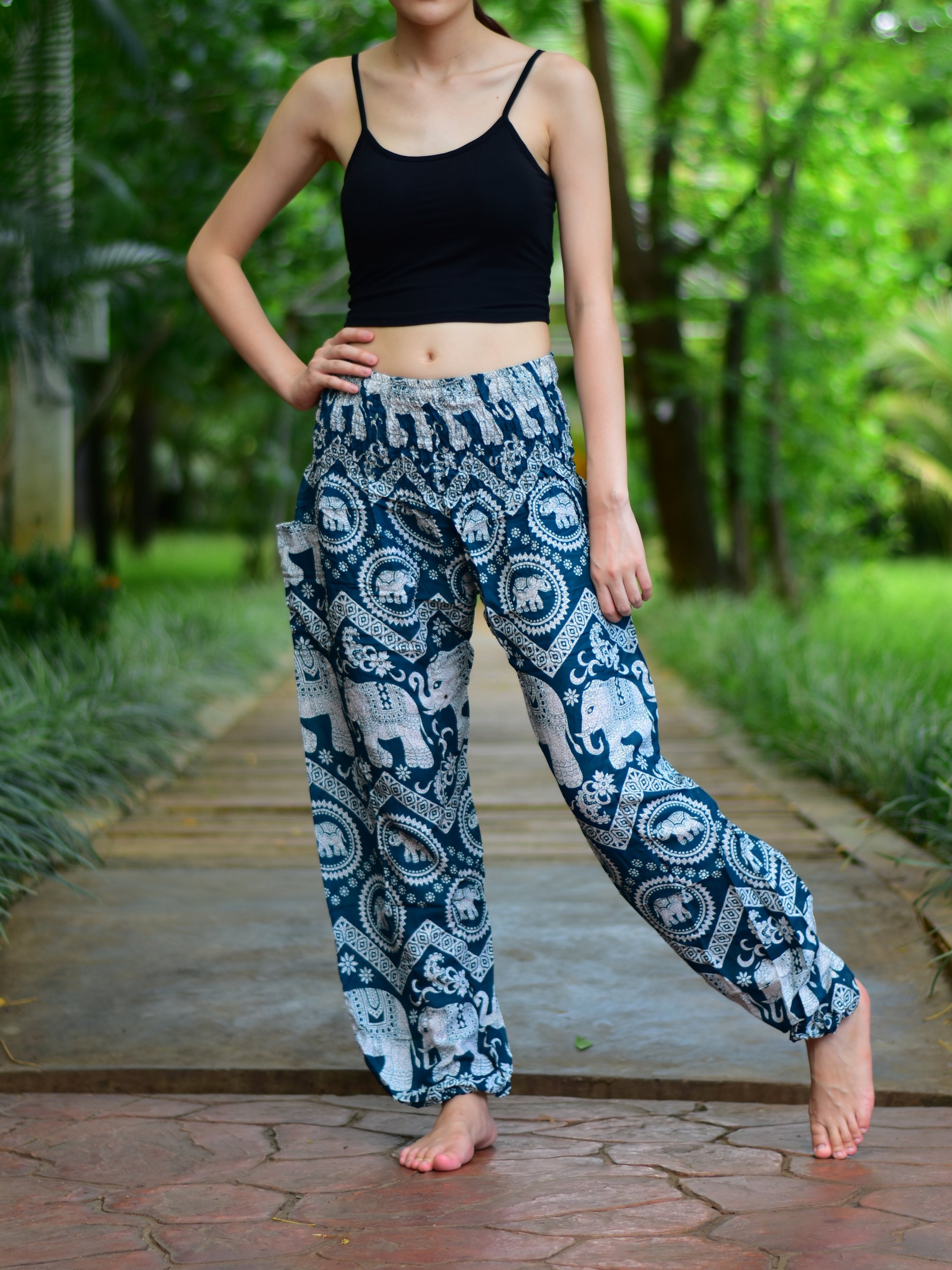 Bohotusk Kids Turquoise Elephant Print Harem Pants featuring a vibrant elephant design, elasticated waist, and lightweight rayon fabric.