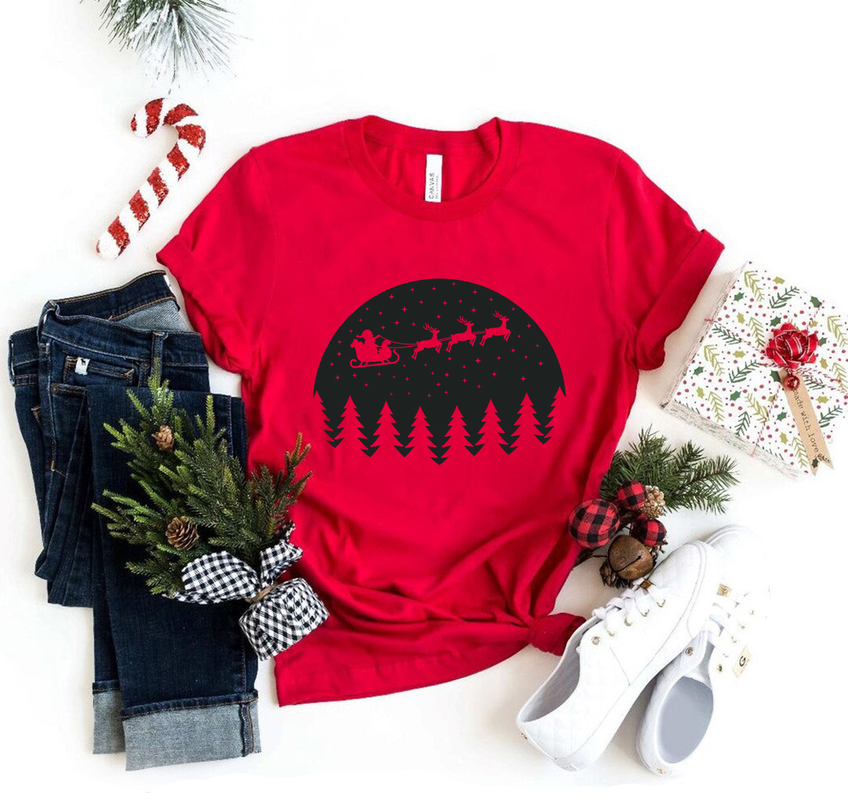 A festive unisex Christmas Scene Shirt made from soft ring spun cotton, featuring a vibrant holiday-themed print.