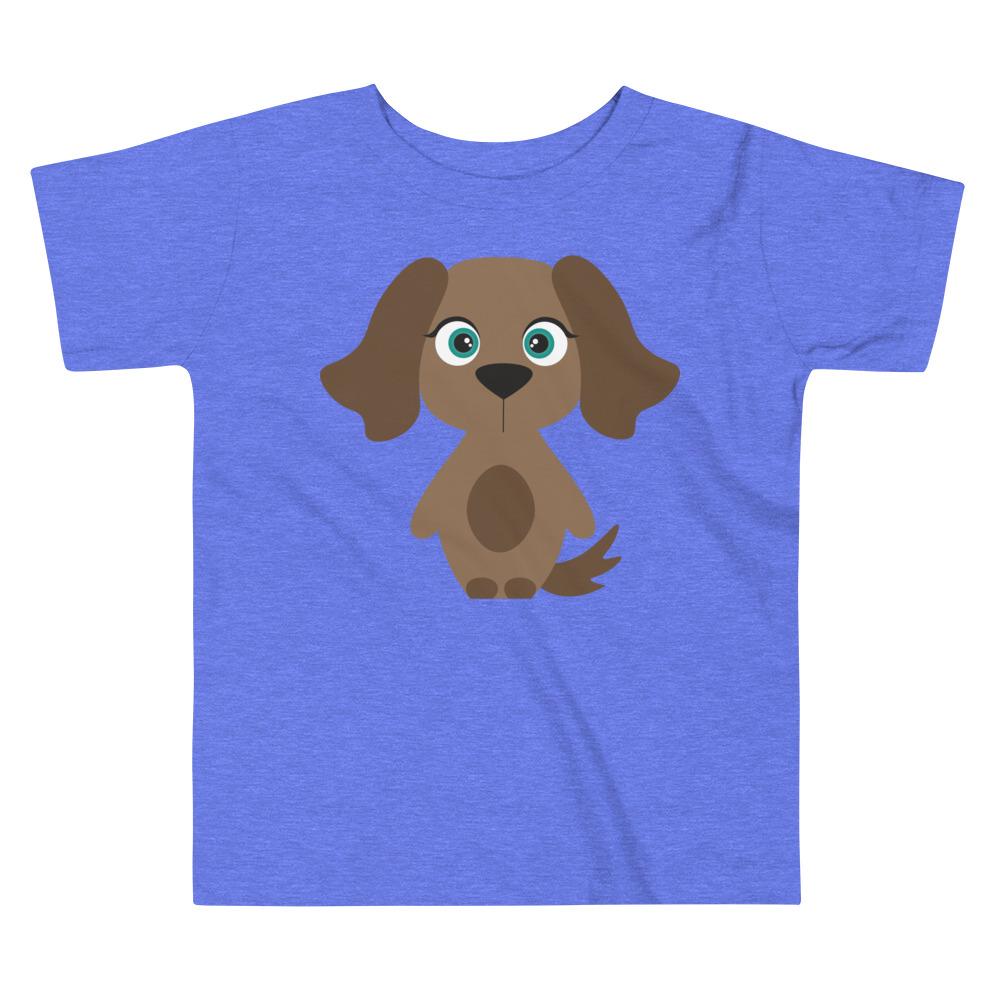 A cute toddler wearing a Dog Kritter T-shirt made of 100% cotton, featuring a relaxed fit and playful dog design.