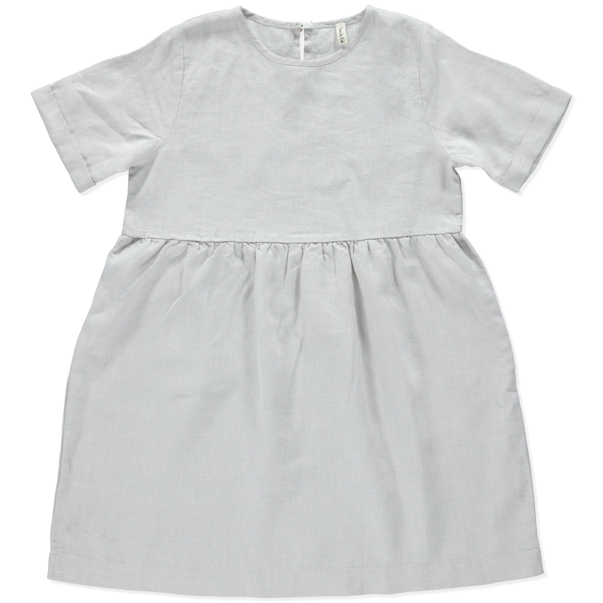 A modern casual dress in cream color made of soft linen, featuring rolled cuff sleeves and an olive wood button closure at the back.