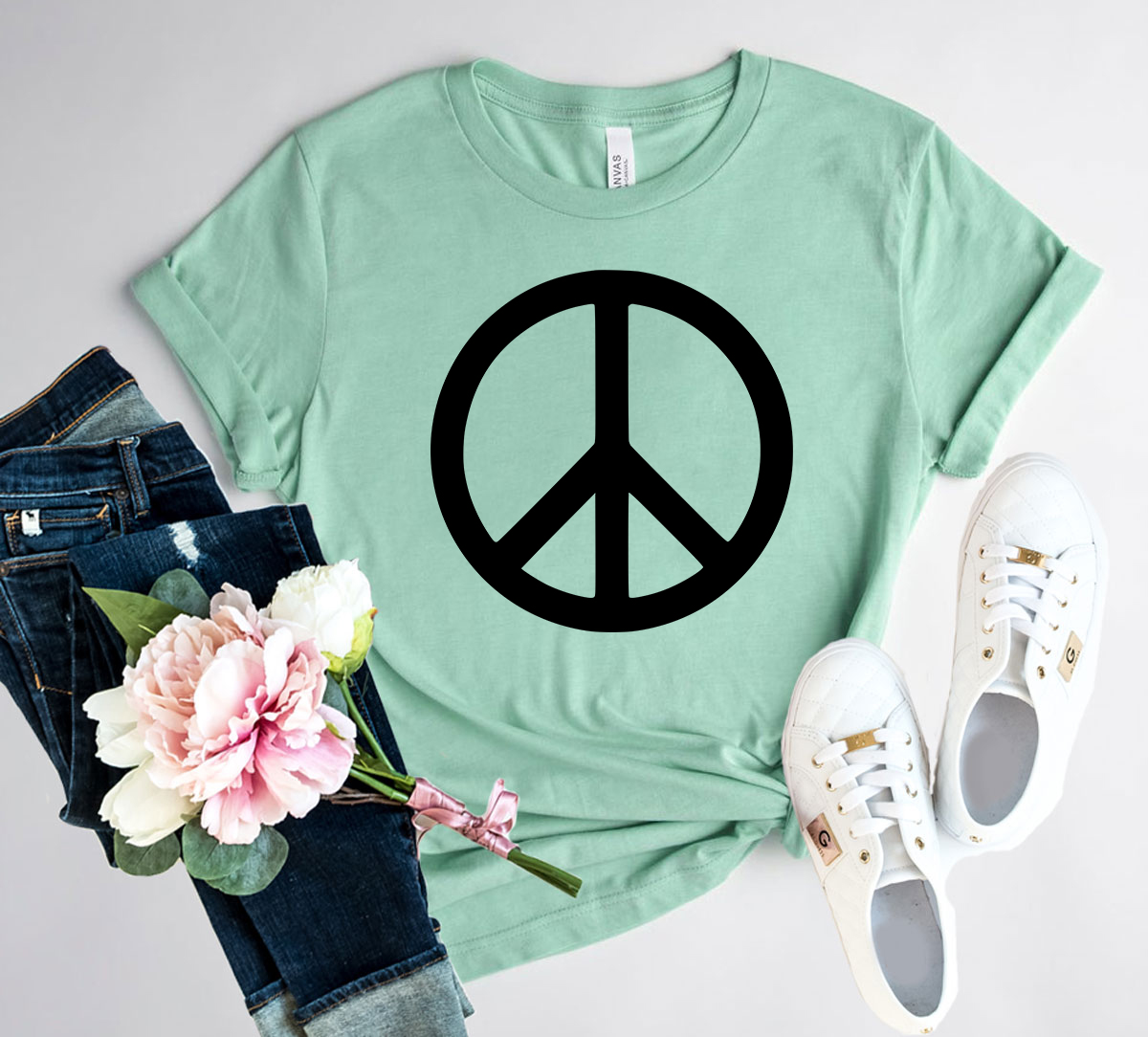 DT0035 Peace Sign Unisex T-shirt in various colors, showcasing its comfortable fabric and stylish design.