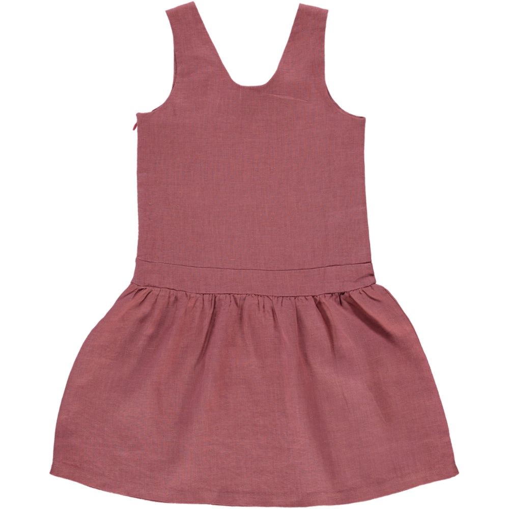 A stylish Dungaree Rose dress made from soft linen, featuring adjustable shoulder straps and a side zip, in beautiful rose, blue celeste, and sienna cream colors.