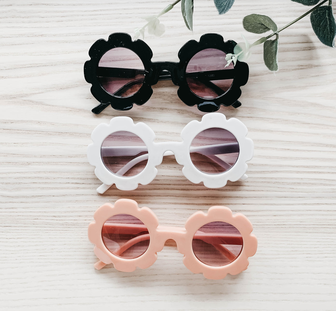 Colorful flower sunglasses with UV protection, perfect for summer beach outings.