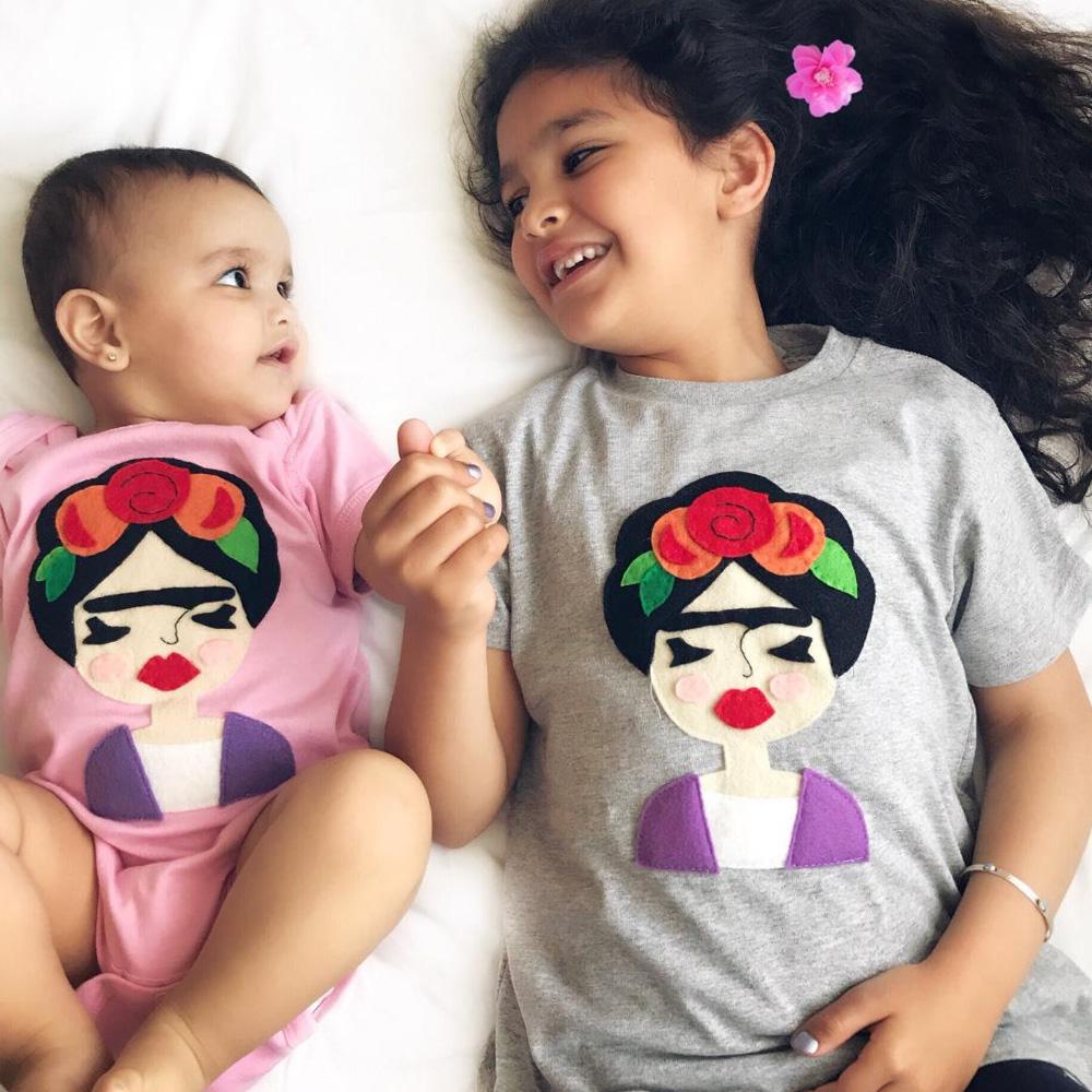 Frida Kids Shirt in Pink and Gray featuring unique felt appliqué designs, handmade and hand-stitched with love.