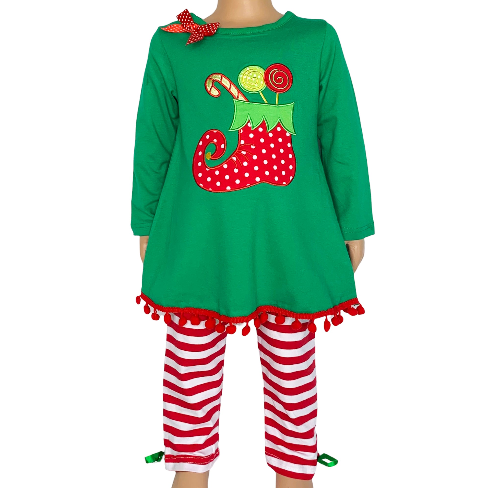 A festive girls outfit featuring an Elf Stocking top with pom pom trim and red & white striped pants, perfect for Christmas celebrations.