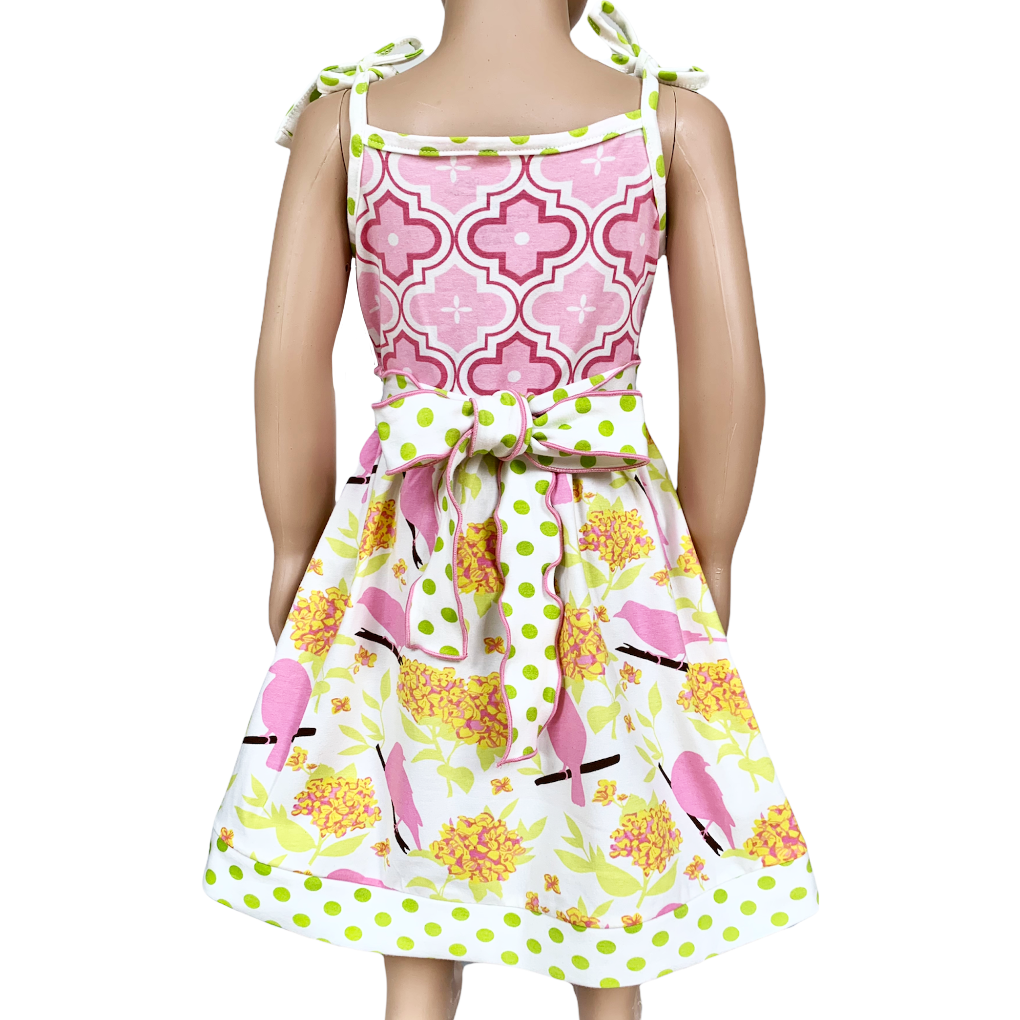 Girls Easter dress featuring spring birds and pink Arabesque print with polka dot sash and bow.