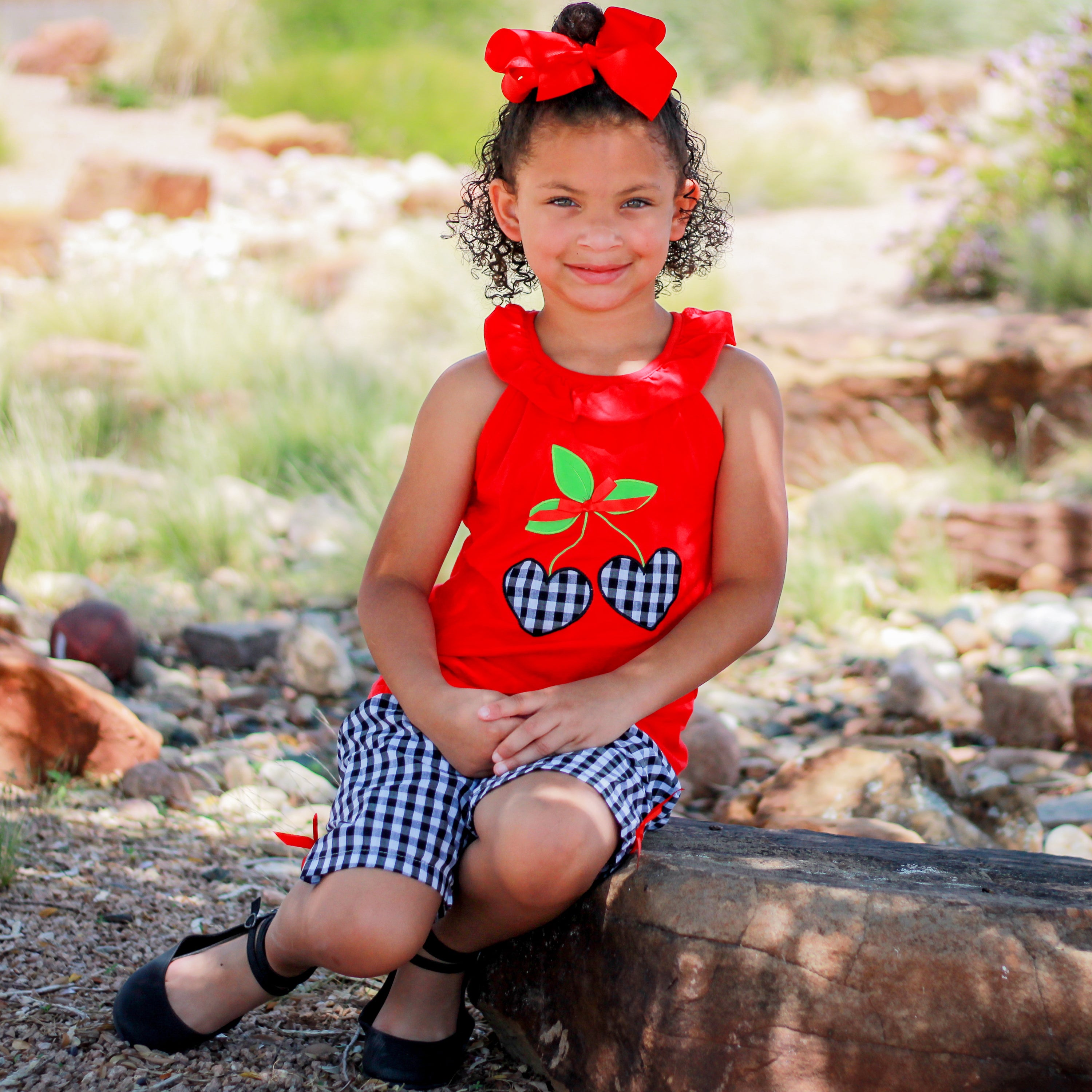 Girls Red Cherry Ruffled Tunic with Gingham Woven Shorts Outfit featuring angel cap sleeves and cherry heart applique.