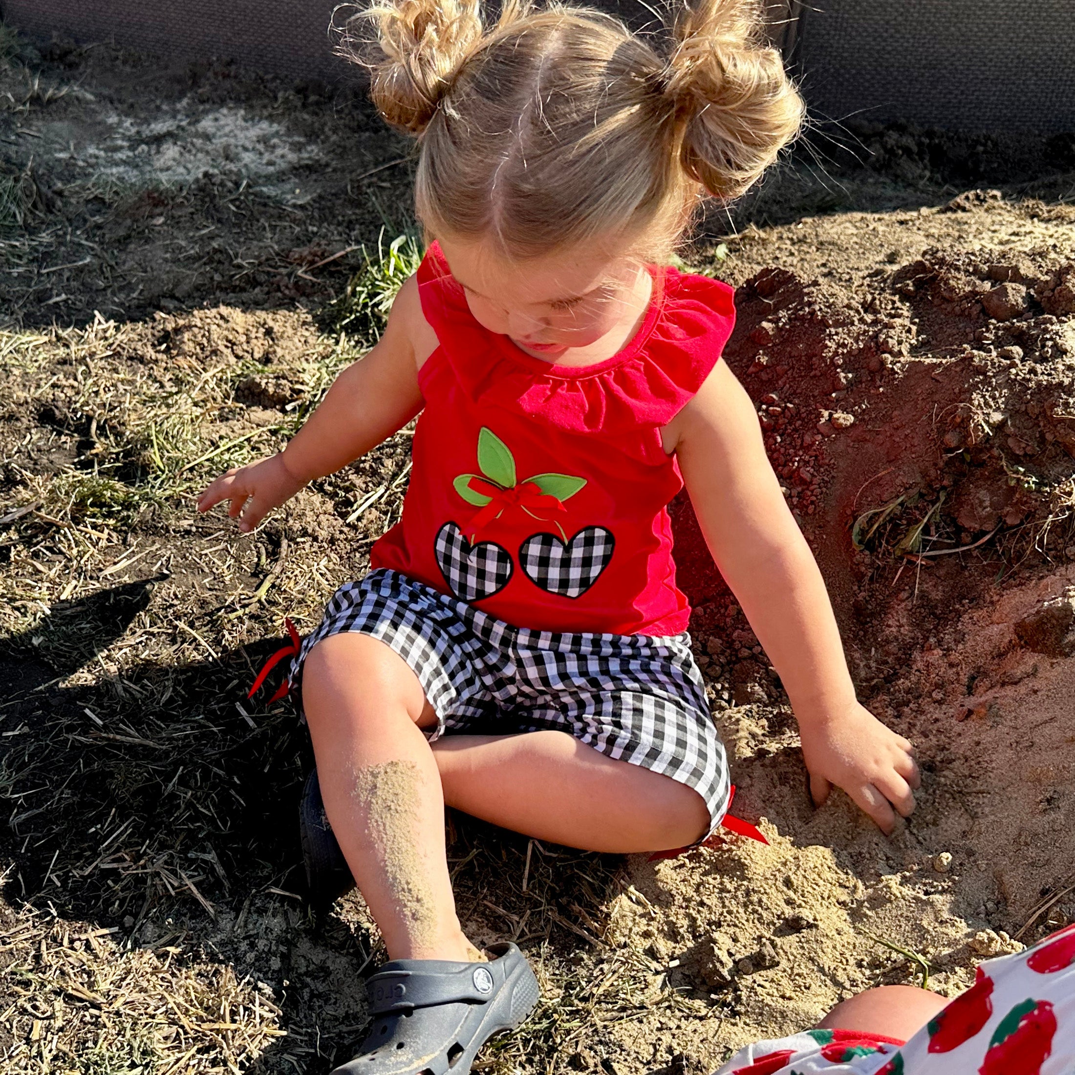 Girls Red Cherry Ruffled Tunic with Gingham Woven Shorts Outfit featuring angel cap sleeves and cherry heart applique.