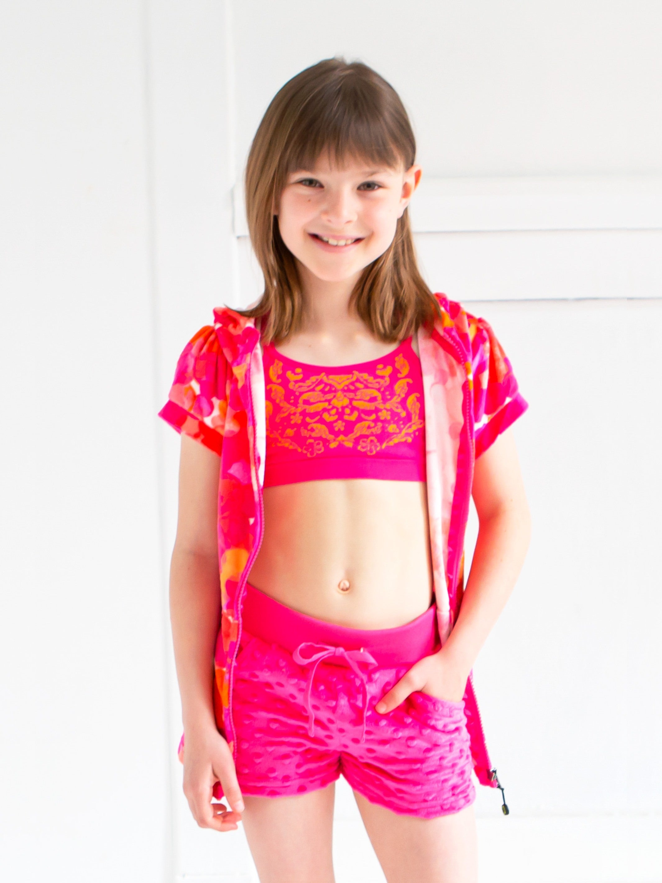 Fuchsia Girls Shorts by Limeapple, featuring a drawstring waistband and lightweight fabric, perfect for active play.