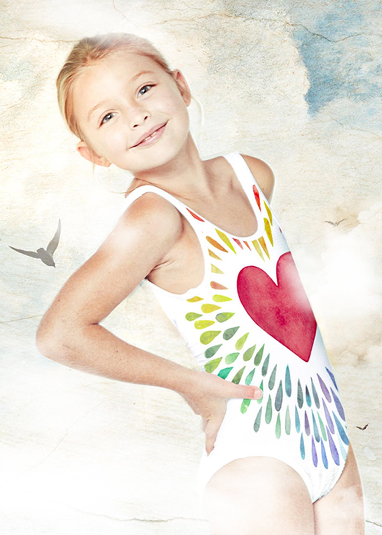 Happy Heart Tank for Girls featuring a vibrant print and matching beach cover-up poncho, perfect for summer fun.