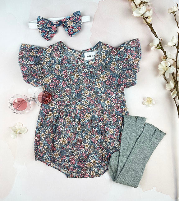 Harper 2 pc flutter onesie in vintage floral print with matching bow headband, perfect for summer wear.