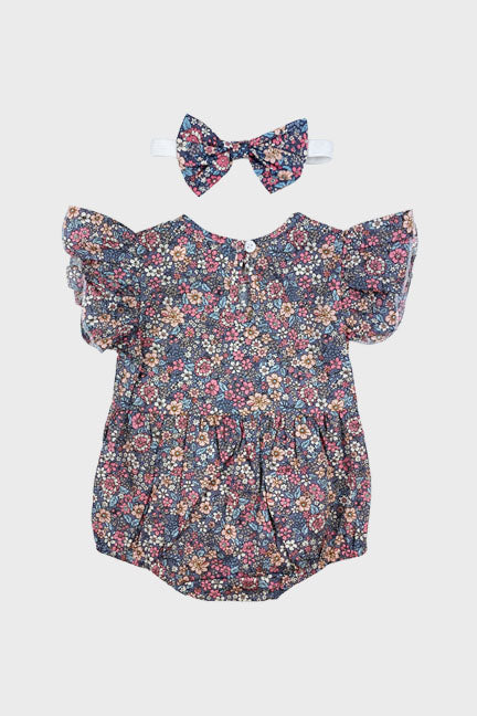 Harper 2 pc flutter onesie in vintage floral print with matching bow headband, perfect for summer wear.