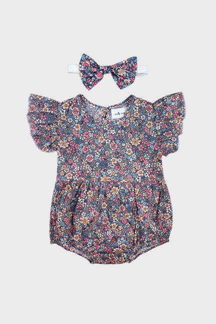 Harper 2 pc flutter onesie in vintage floral print with matching bow headband, perfect for summer wear.