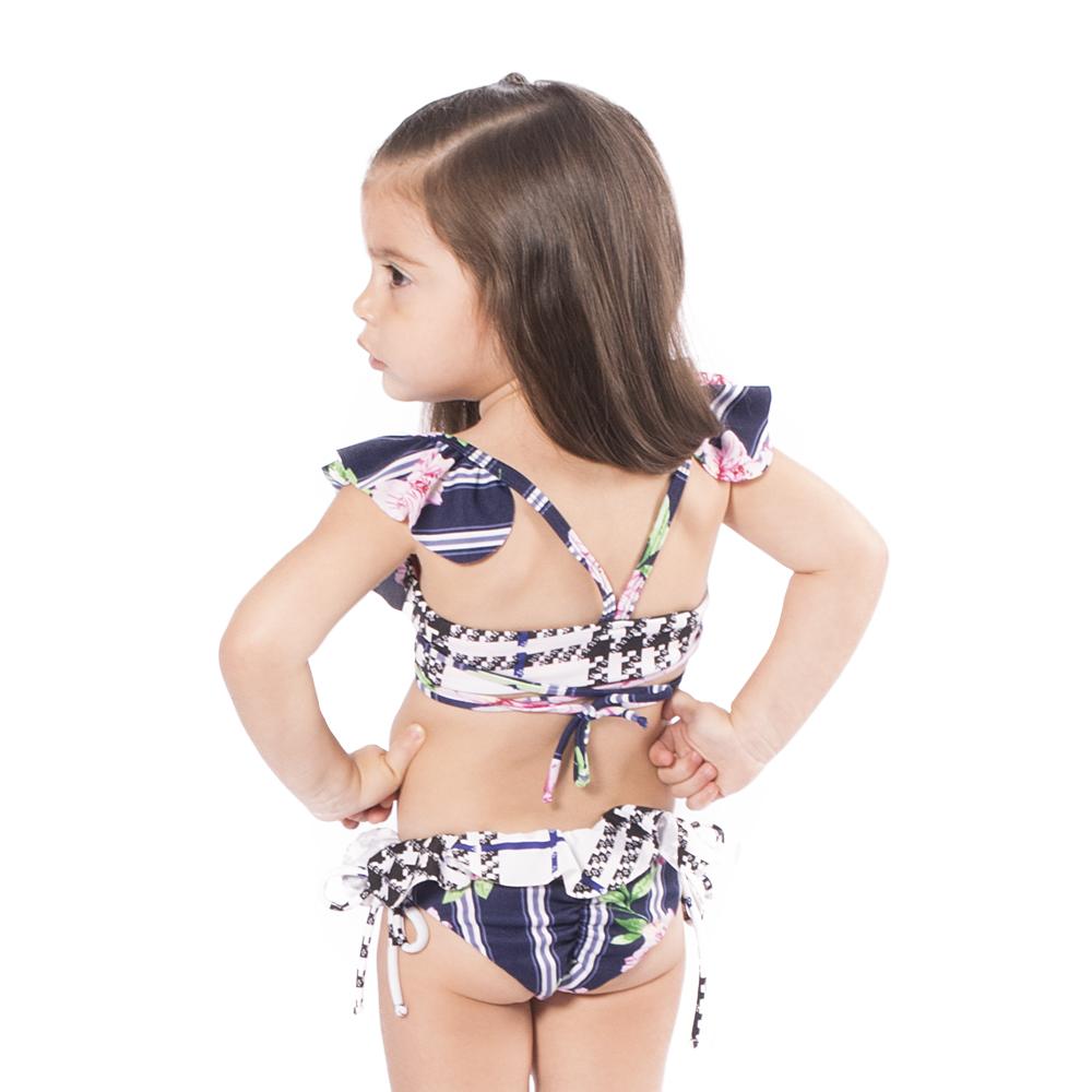 I Plaid You Kids Bikini featuring bright floral and geometric prints in pink, black, and white, designed for comfort and play.