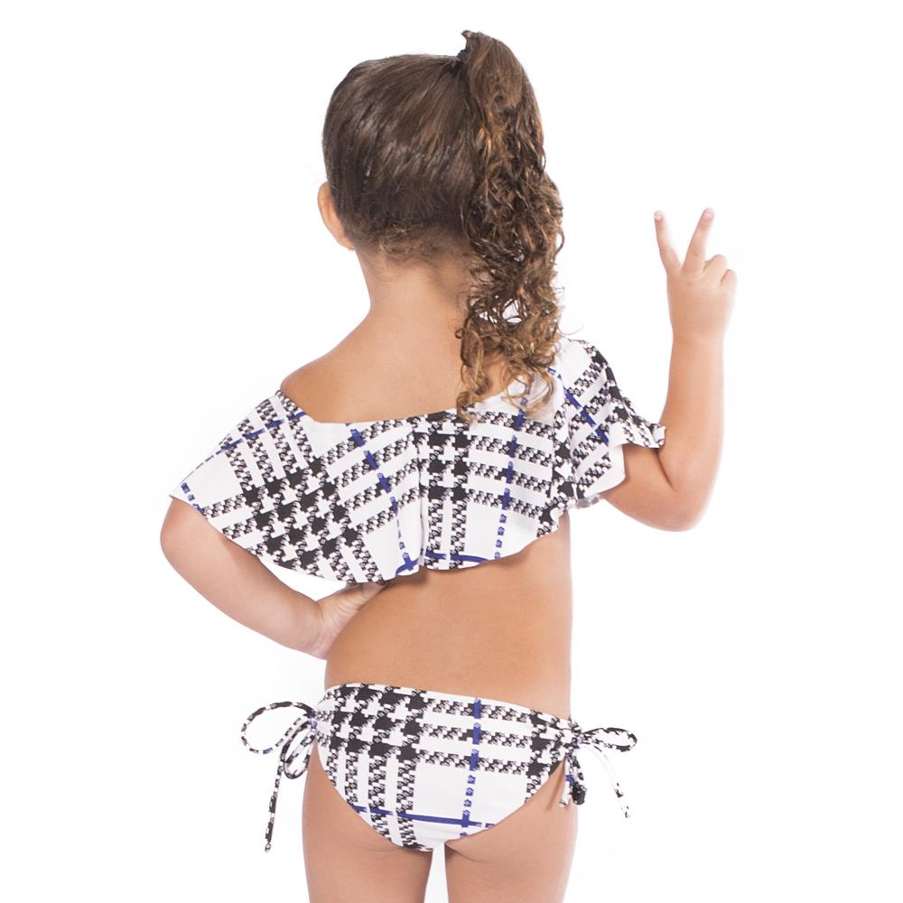 I Plaid You Trikini for kids featuring a stylish black and white design with off-shoulder style and adjustable side ribbons.