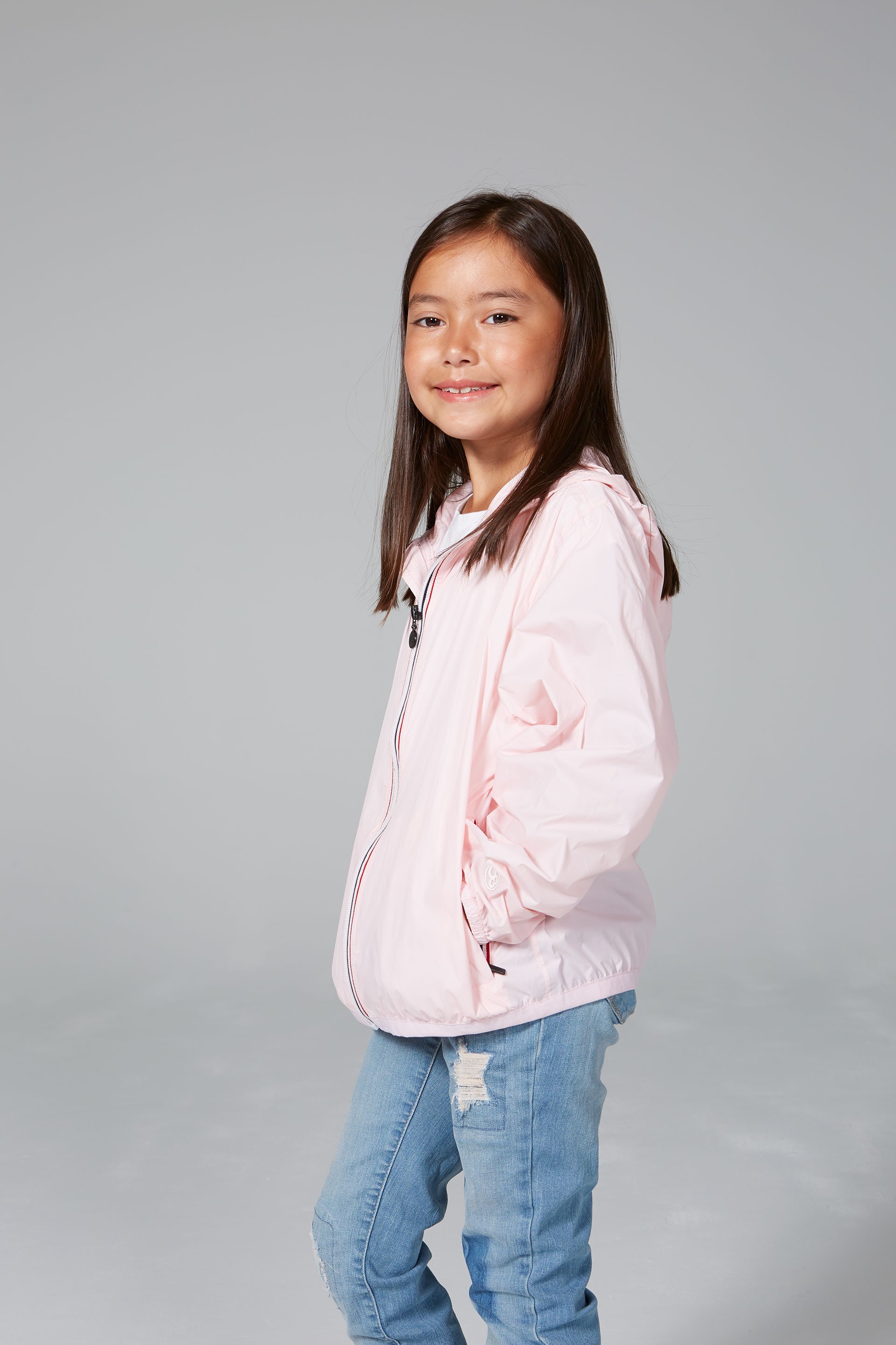 Kids Ballet Slipper Full Zip Packable Rain Jacket in vibrant colors, showcasing its waterproof design and packable feature.