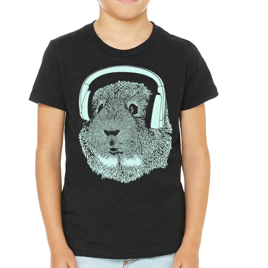 A cute kid's shirt featuring a guinea pig wearing headphones, showcasing vibrant colors and a playful design.