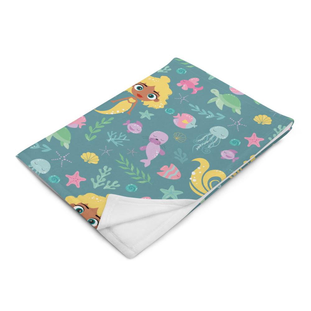 Kritter Mermaid Sea Throw Blanket featuring vibrant mermaid design on one side and white reverse side, made from soft polyester fabric.