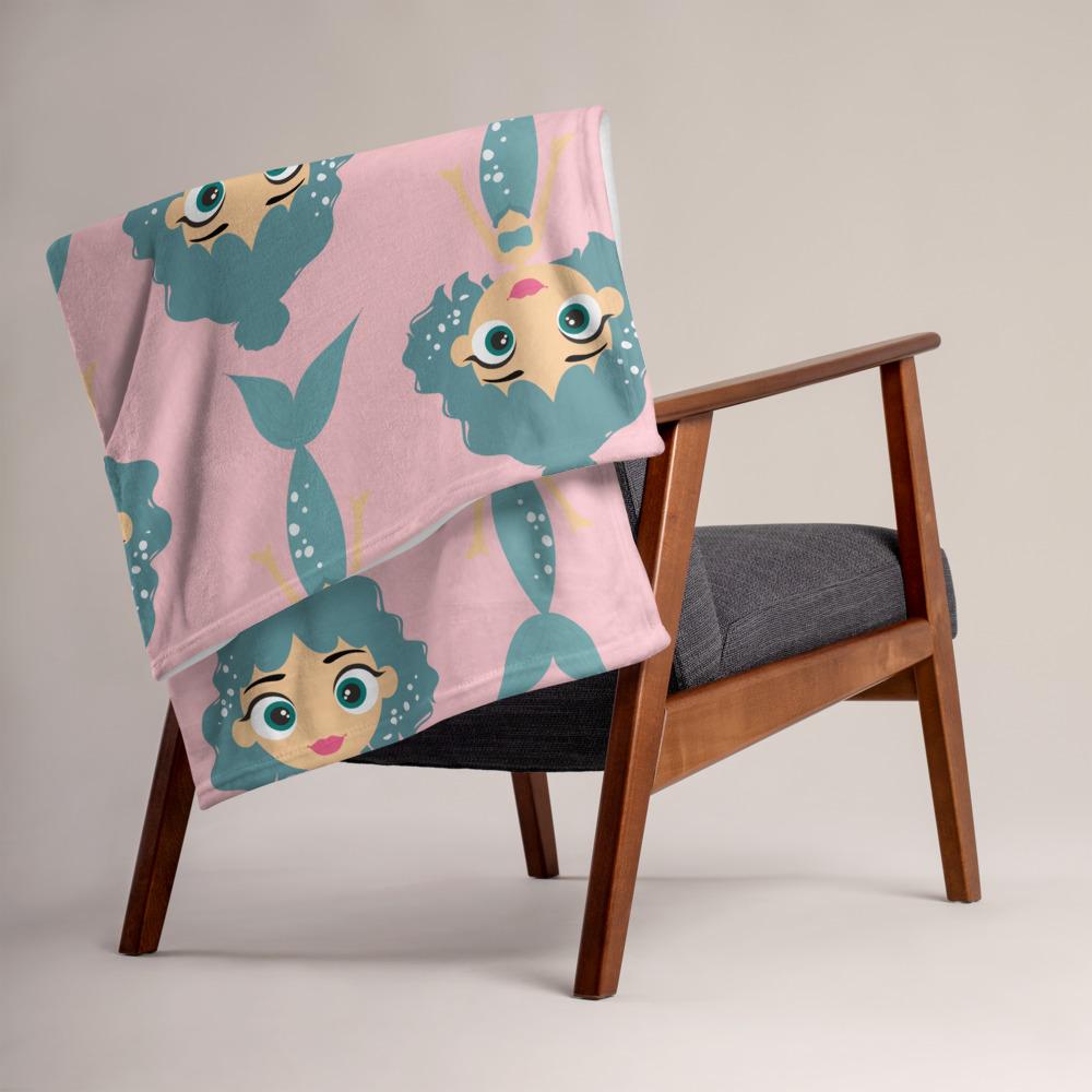 Kritter Mermaid Throw Blanket featuring vibrant mermaid design on one side and soft white reverse side, perfect for cozying up.