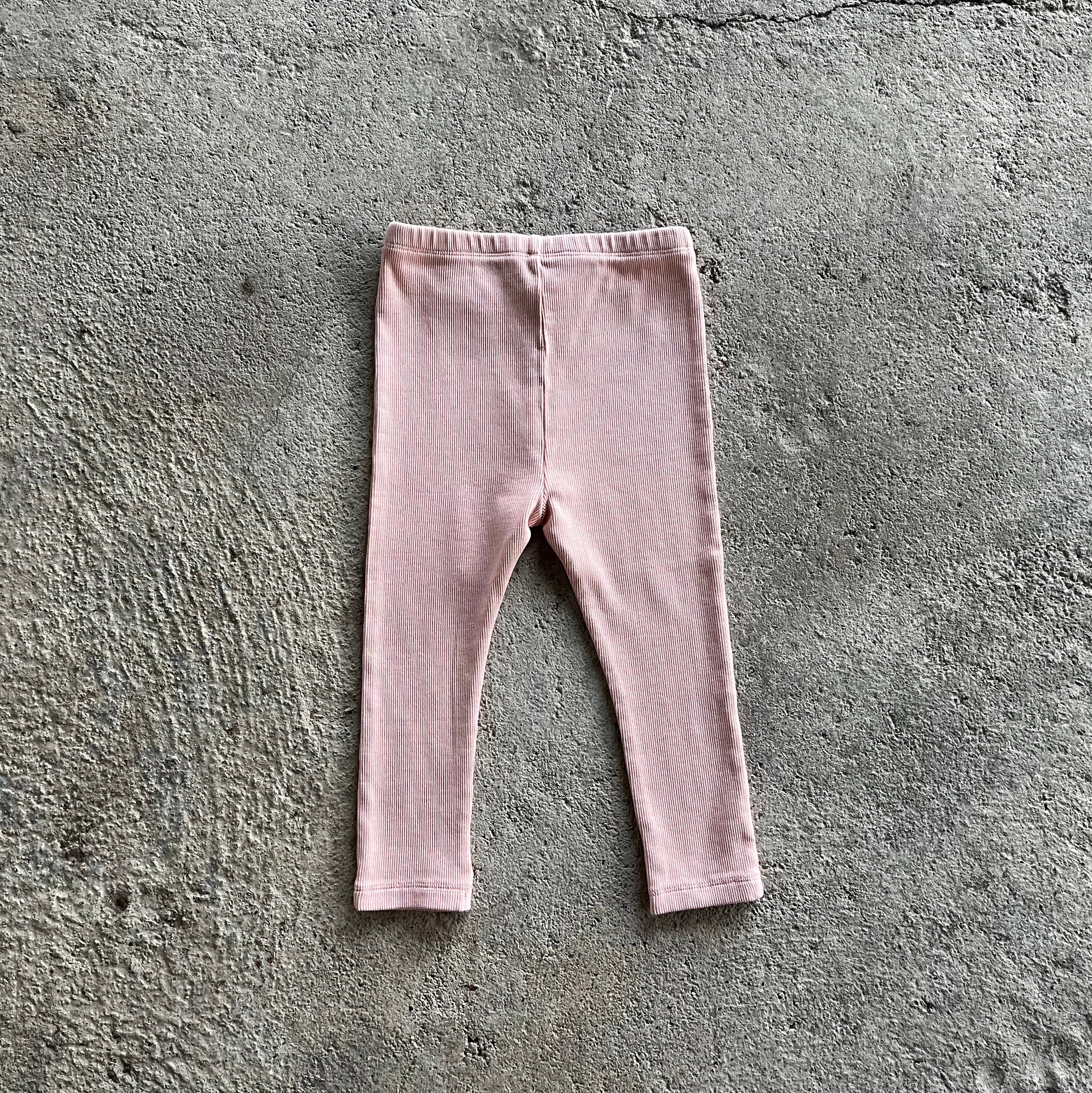 Oggy Pink Leggings for babies and toddlers, featuring a soft ribbed texture and elasticised waist, perfect for comfort and style.