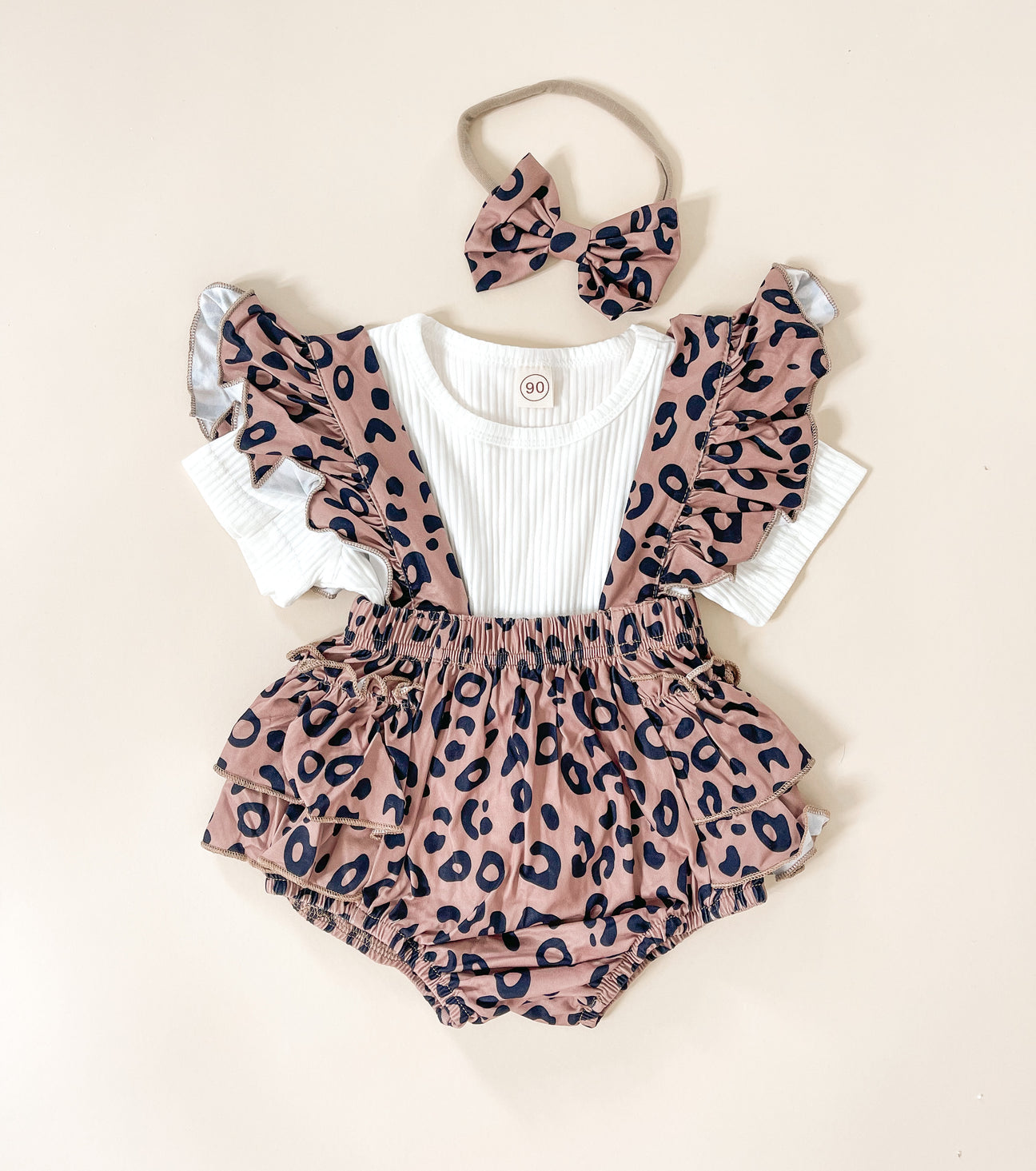 Leopard Suspender Outfit Set featuring soft cotton fabric and stylish design.