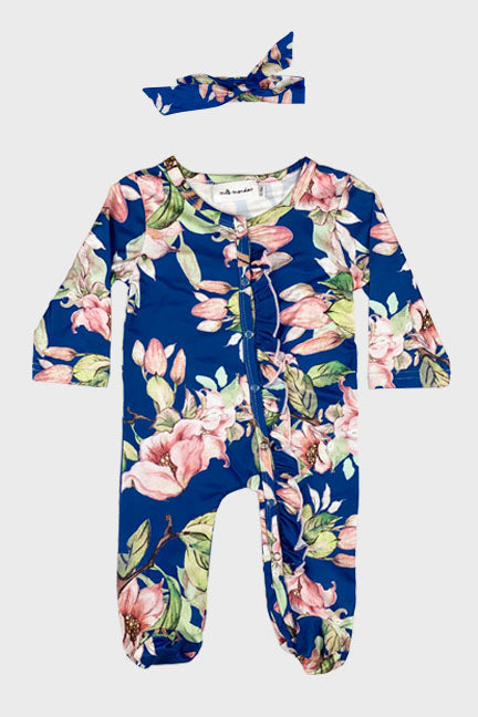 A blue floral long sleeve footed onesie with ruffle details and a matching tie headband, perfect for babies.