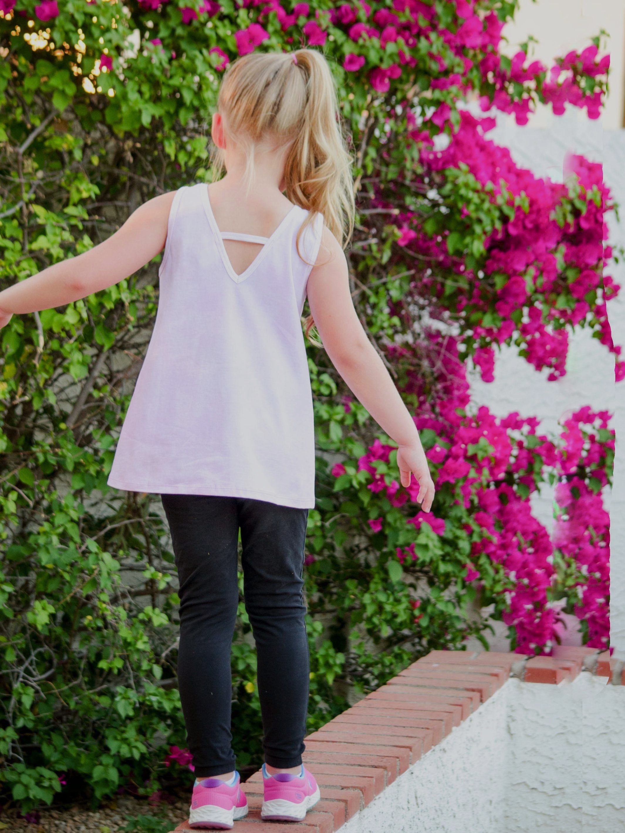 Nassau Graphic Tank Top in pastel tie-dye with minimal graphic print and back V neckline, perfect for summer wear.