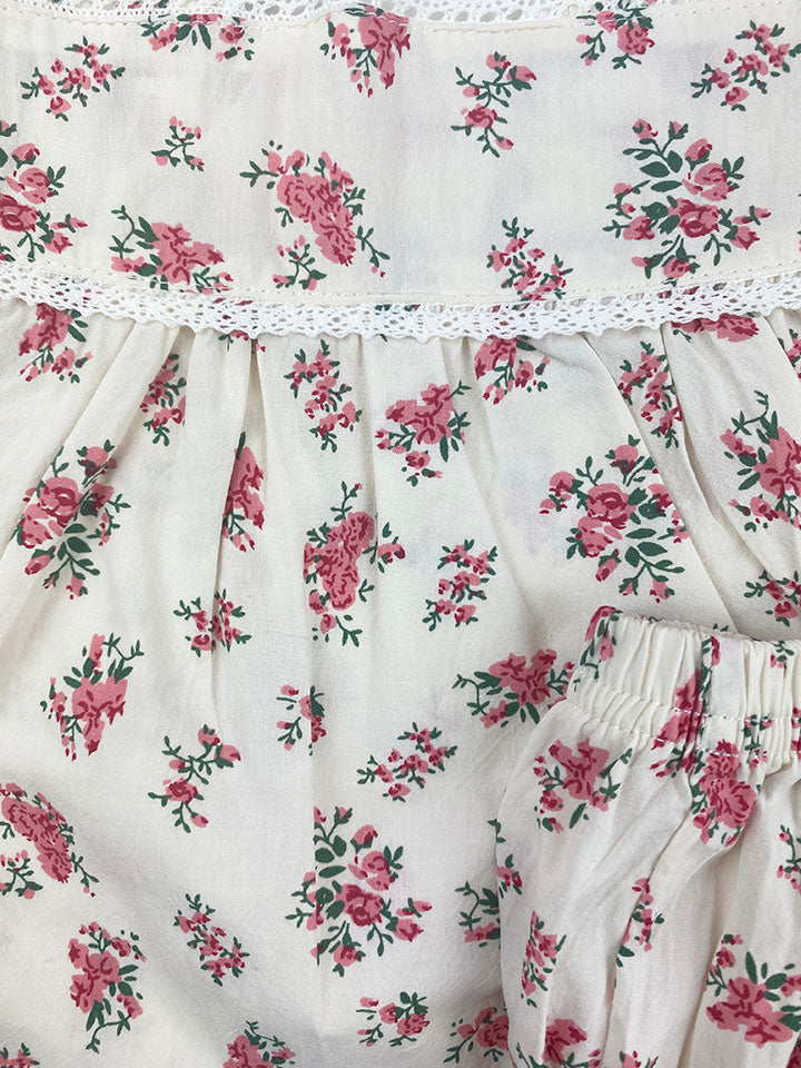 Nora 2 pc set featuring a red floral print on a soft cotton fabric, including a top with lace trim and matching bloomer shorts.