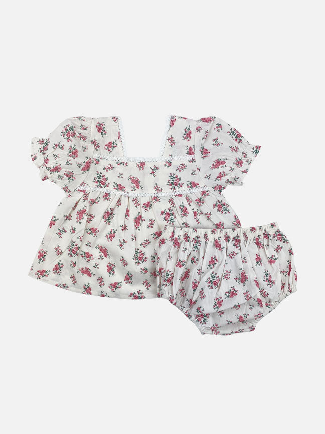 Nora 2 pc set featuring a red floral print on a soft cotton fabric, including a top with lace trim and matching bloomer shorts.