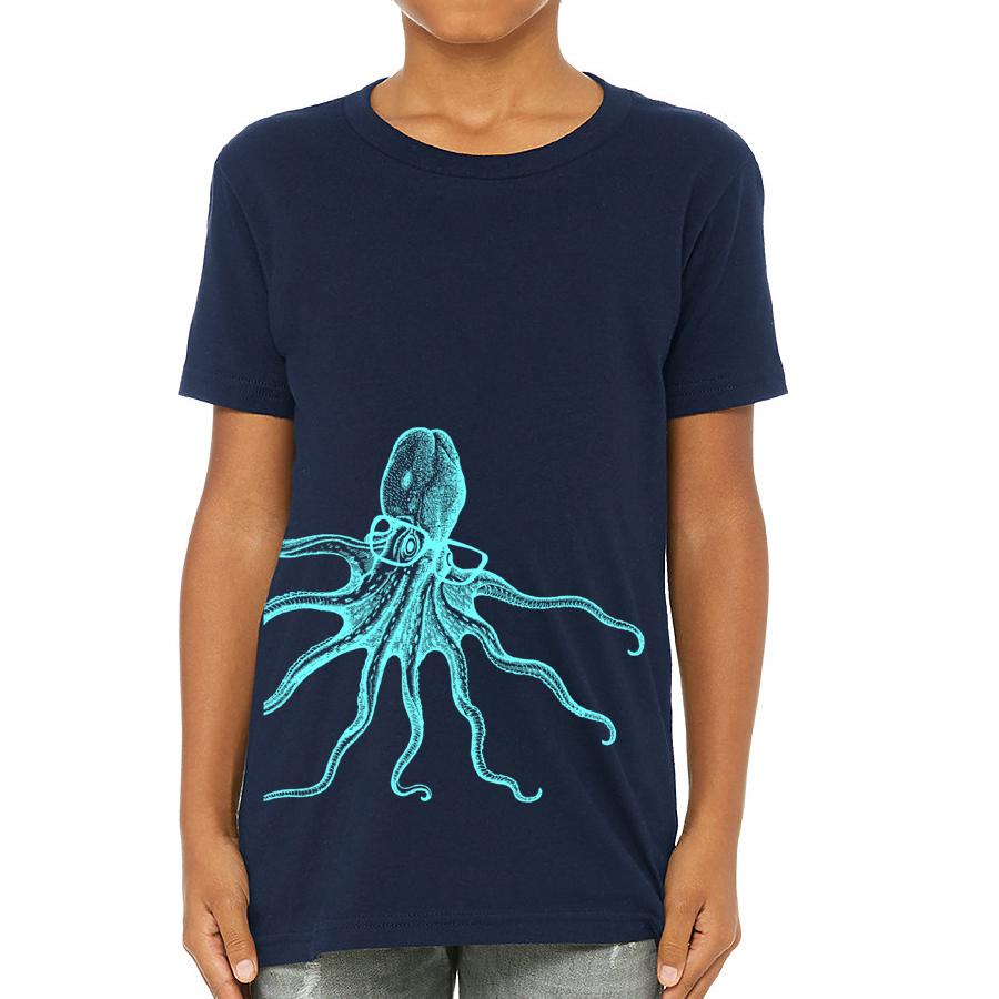 Child wearing octopus graphic shirt.