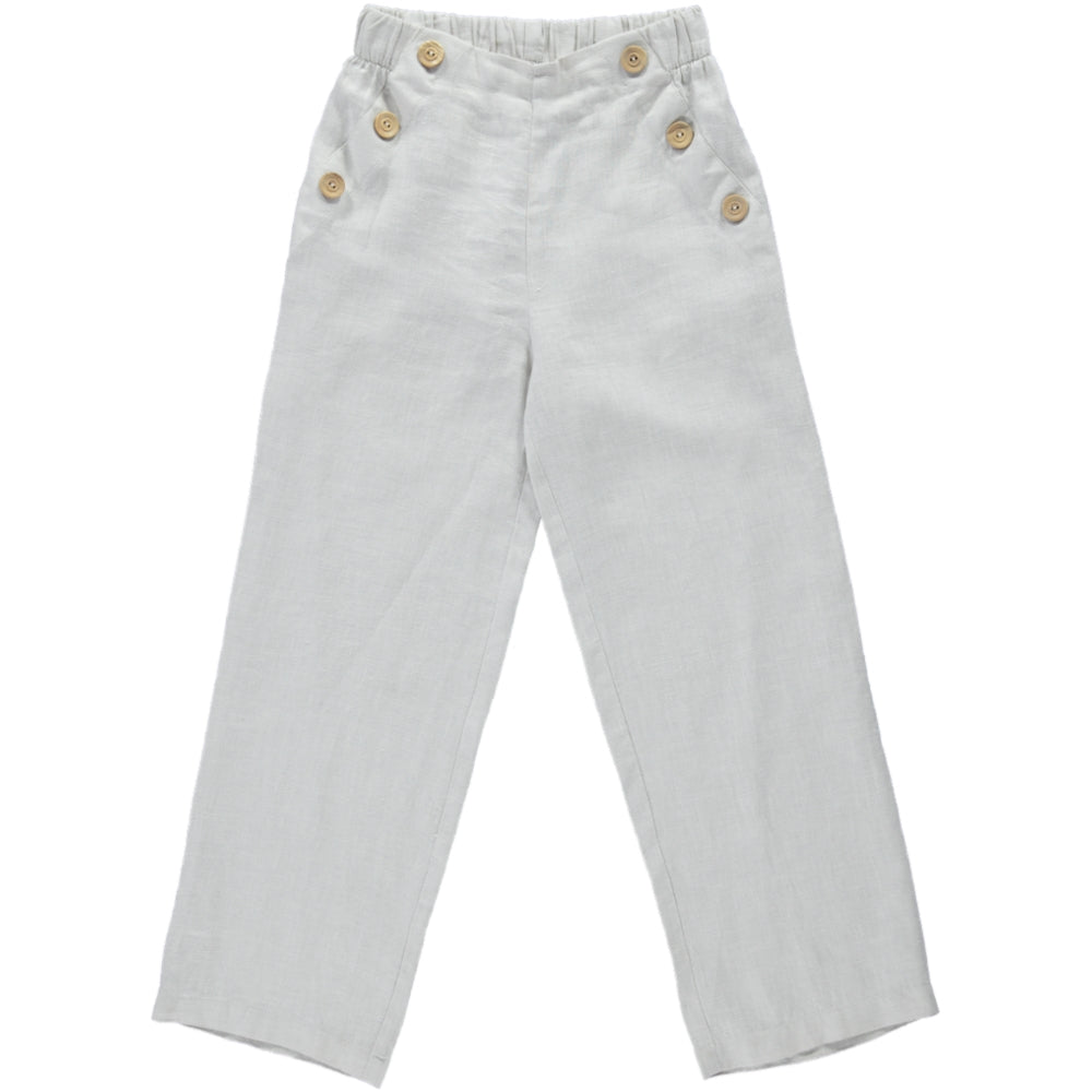 Aster Creme Pants featuring a straight leg design, wood buttons on the sides, and an elasticised waist, made from 100% breathable linen.