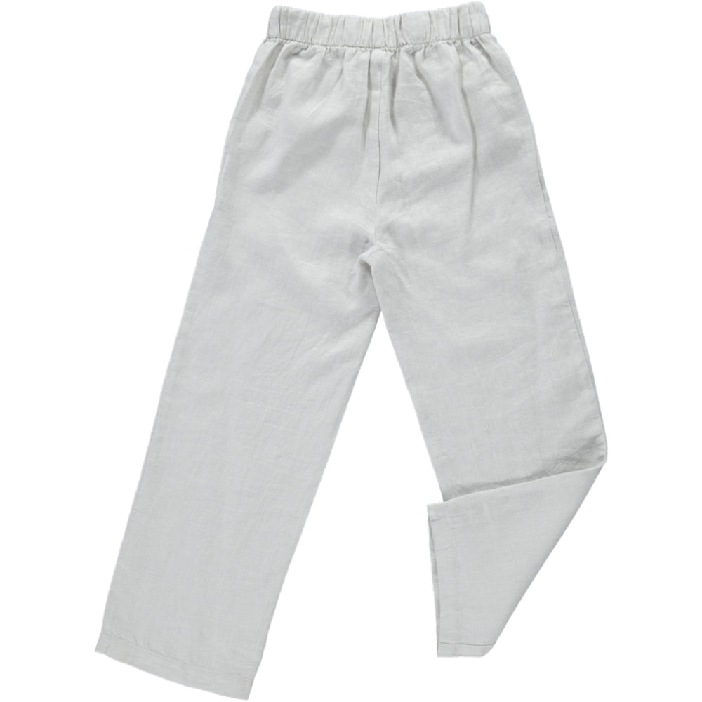 Aster Creme Pants featuring a straight leg design, wood buttons on the sides, and an elasticised waist, made from 100% breathable linen.