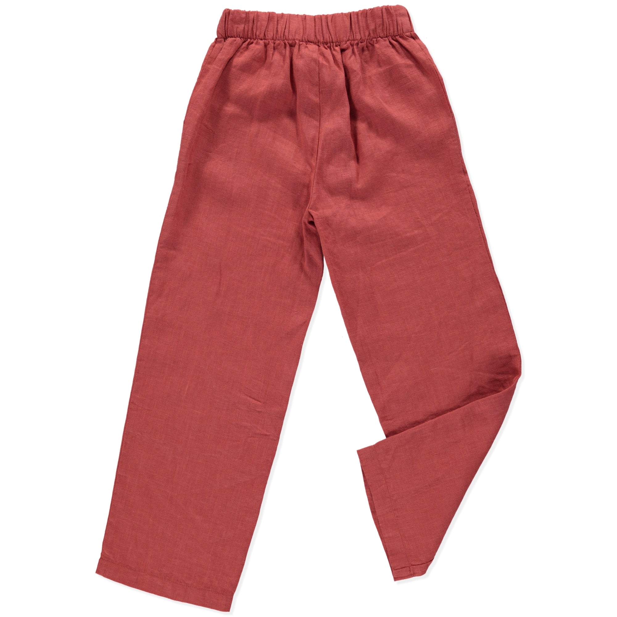 Aster Terracotta Pants featuring a straight leg design, wood buttons on the sides, and an elasticised waist, made from lightweight linen fabric.