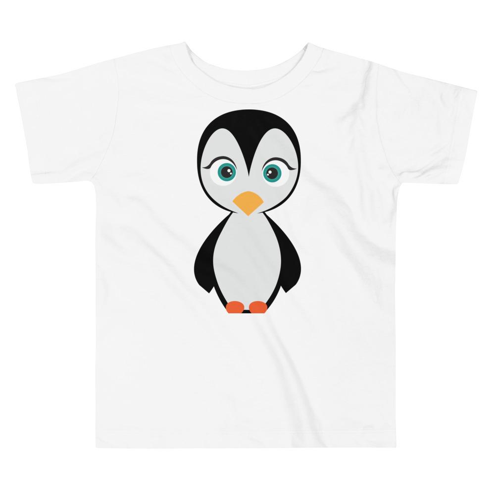 A cute toddler wearing a Penguin Kritter T-shirt made of soft cotton, featuring a playful penguin design.