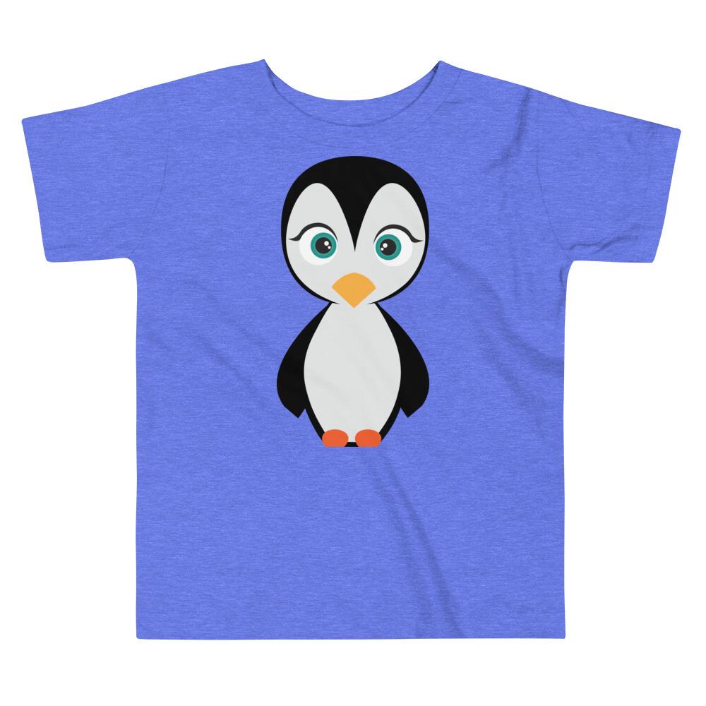 A cute toddler wearing a Penguin Kritter T-shirt made of soft cotton, featuring a playful penguin design.