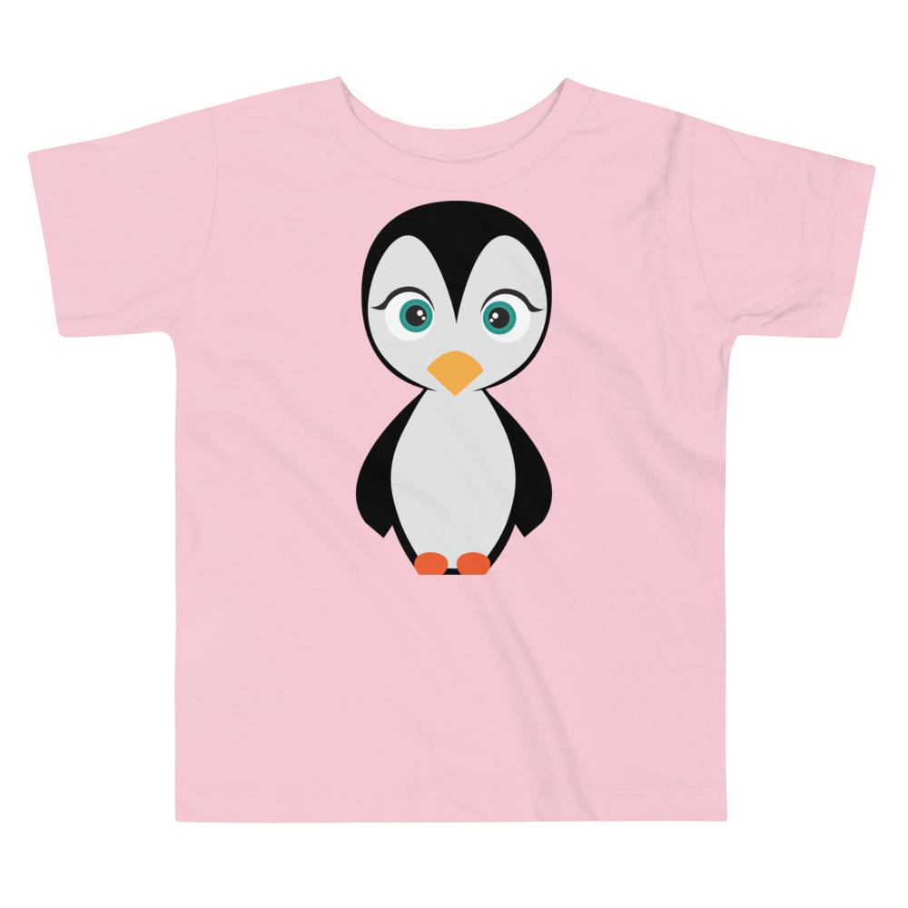 A cute toddler wearing a Penguin Kritter T-shirt made of soft cotton, featuring a playful penguin design.